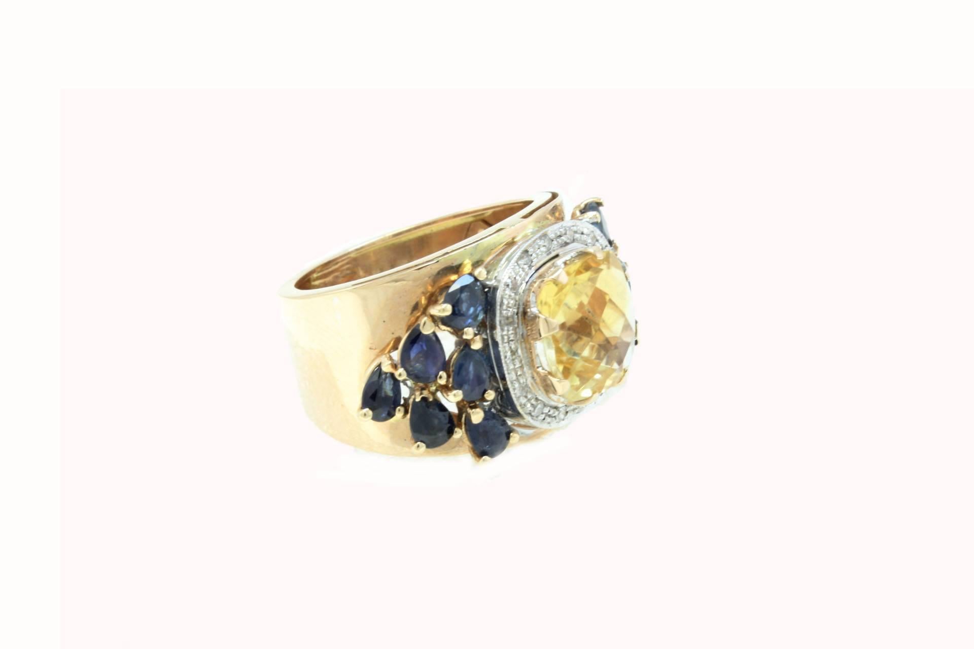 Amazing band ring composed of shiny central topaz surrounded of blues sapphires and a frame of diamonds, all is mounted in 14Kt rose gold,
Tot weight 6.5 g
Ring size : ITA 14.5 - French 54.50 - US 7 - UK O
Diamonds 0.13 ct
Topaz 2.92 ct
Blue