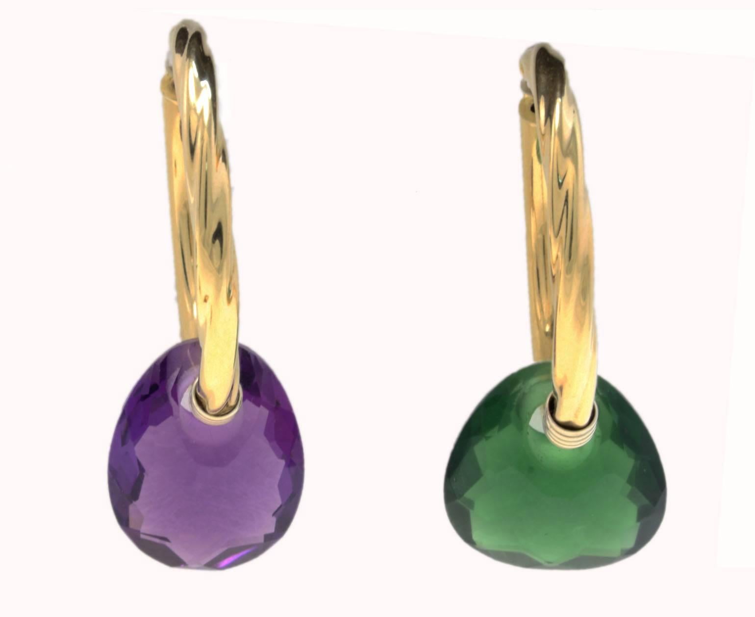Fancy hoop earrings, they have been made to be wear in all the occasions and also, you can change as you feel. The quartz stones  and the amber are changeable, you can choose between the green and the purple quartz or the amber  to add to the