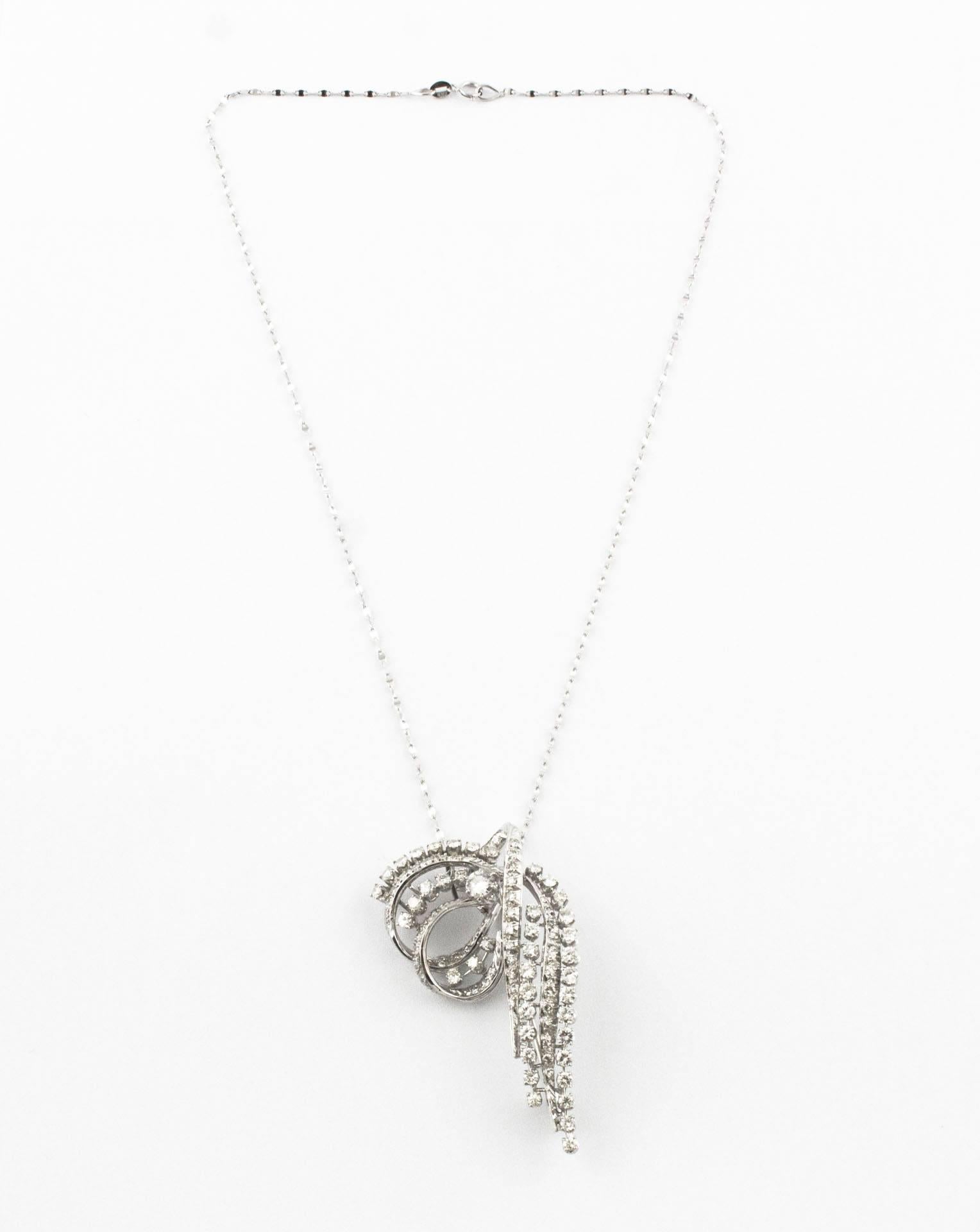 Delightful and Lovely pendant necklace/brooch in 18 kt white gold mounted with diamonds 
total weight 10,80 g
R.F OUCH 