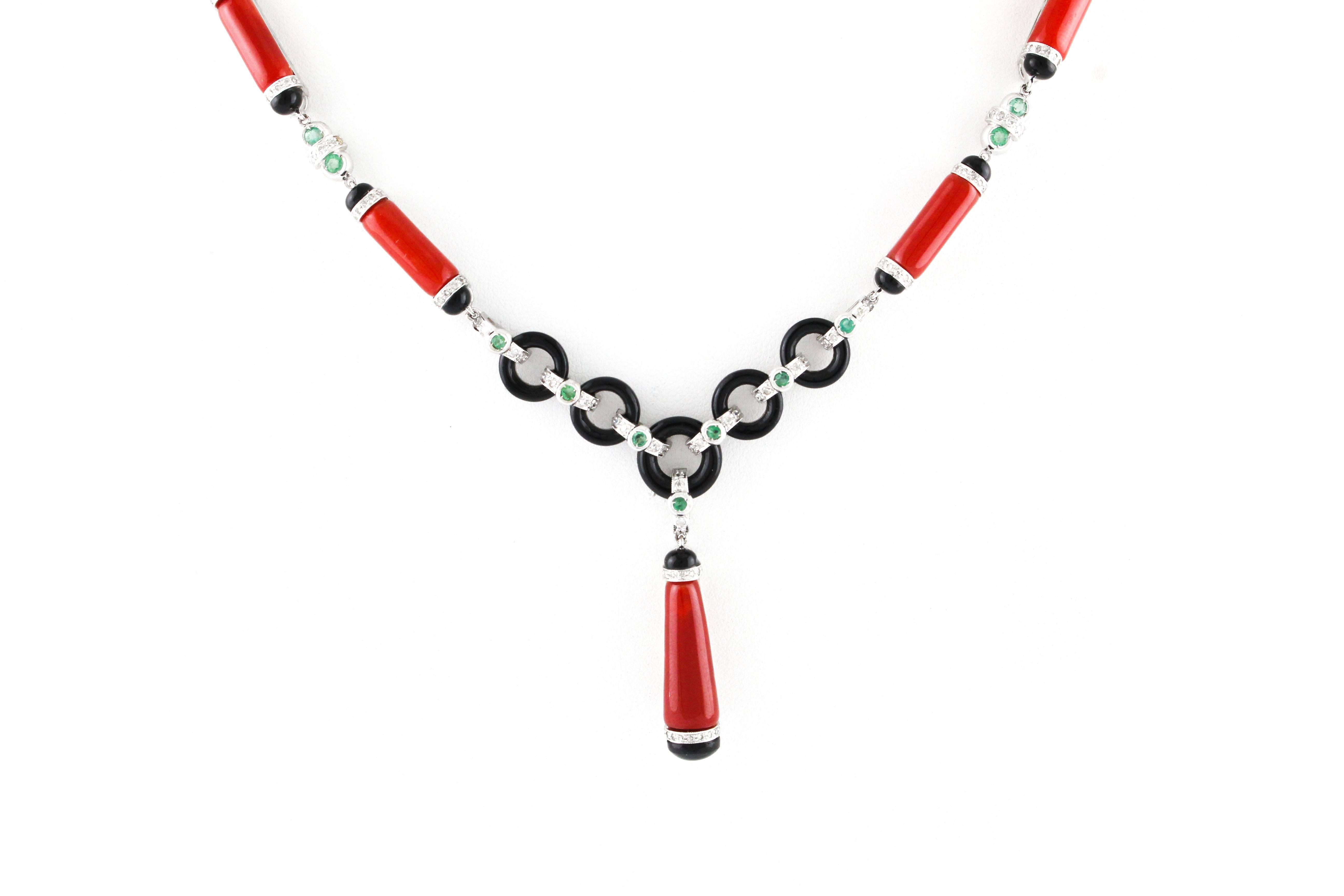 
Wonderful necklace in 14 kt gold, 37.56 g, original in its design, is enriched with onyx and emerald diamonds, its particularity is the precious rubrum coral that makes it very elegant.
Diamonds 1.37 ct
Emeralds 1,14 ct
Total weight  37,56 g

RF