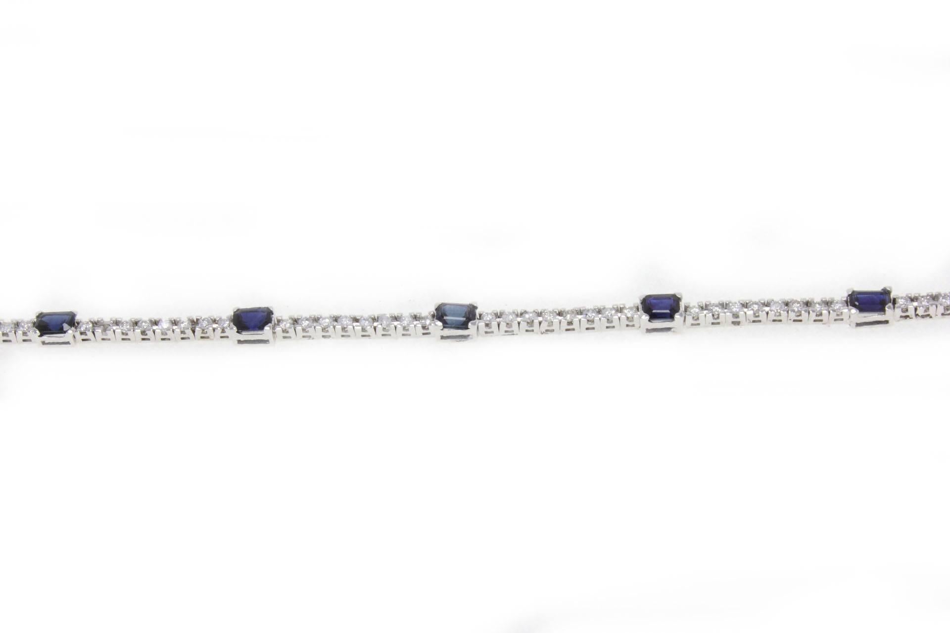 Tennis bracelet in 14kt white gold composed of an exquisite string of white diamonds alternated with blue sapphires.

diamonds 0.96kt
blue sapphires 1.98kt
tot weight 
US Size
Width diamonds 0.0079 inches  Width sapphire 0.012 inches
Lenght 6.70