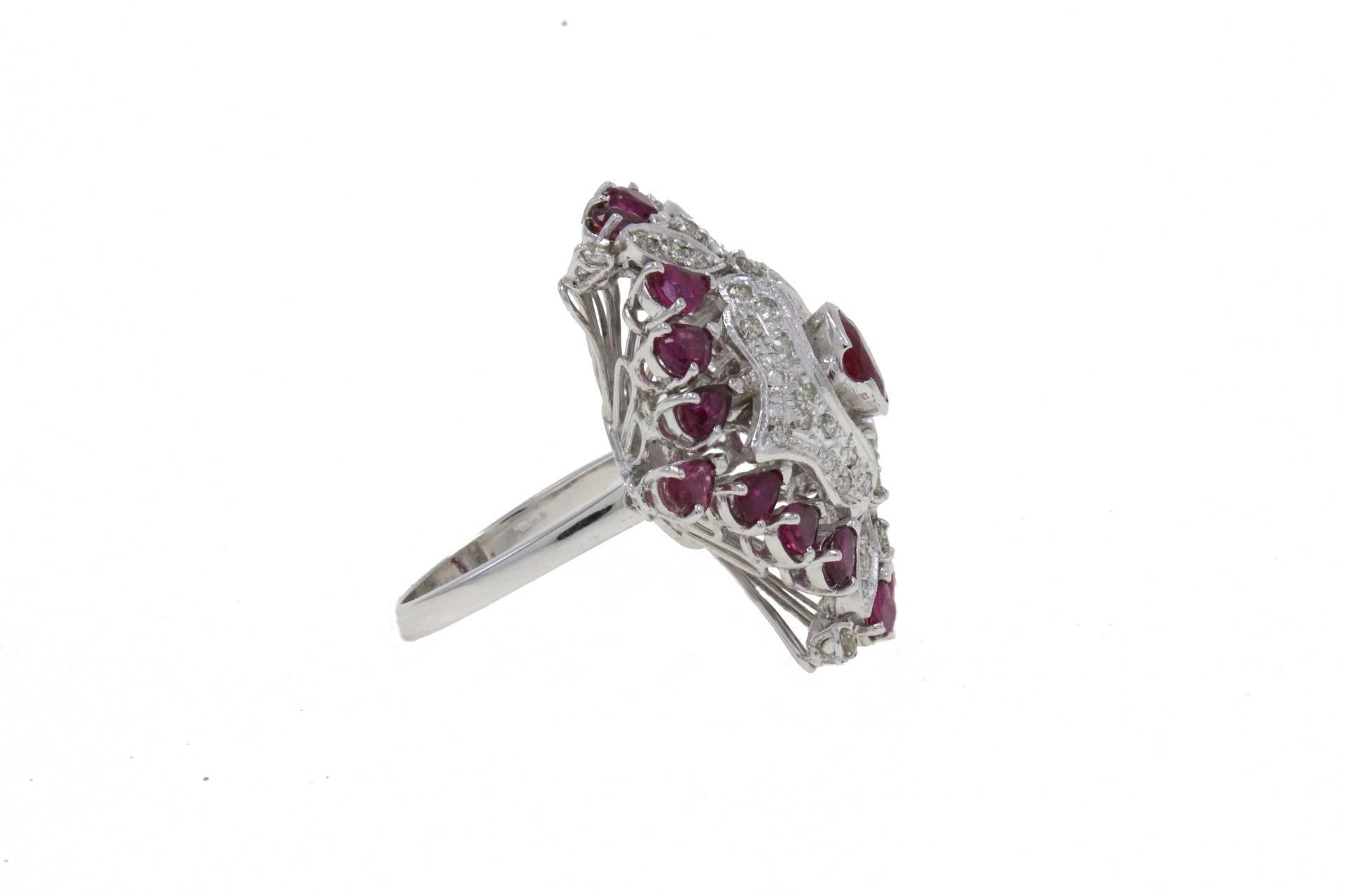 SHIPPING POLICY:
No additional costs will be added to this order.
Shipping costs will be totally covered by the seller (customs duties included).

Sparkling ring in 14kt white gold embellished with a central ruby surrounded by diamonds and a crown