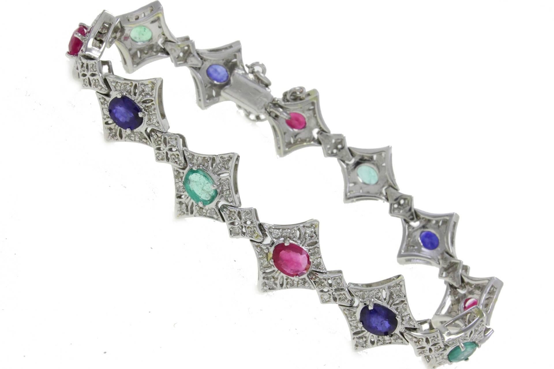 

Retro bracelet in 14kt white gold composed by blue sapphire, rubies and emeralds surrounded by diamonds.
  diamond 0.92kt
blue sapphire, rubies, emeralds 4.61kt
tot weight 19gr
US Size
Width 0.40 inches
Lenght 7.09 inches
ref,oiea 
For any