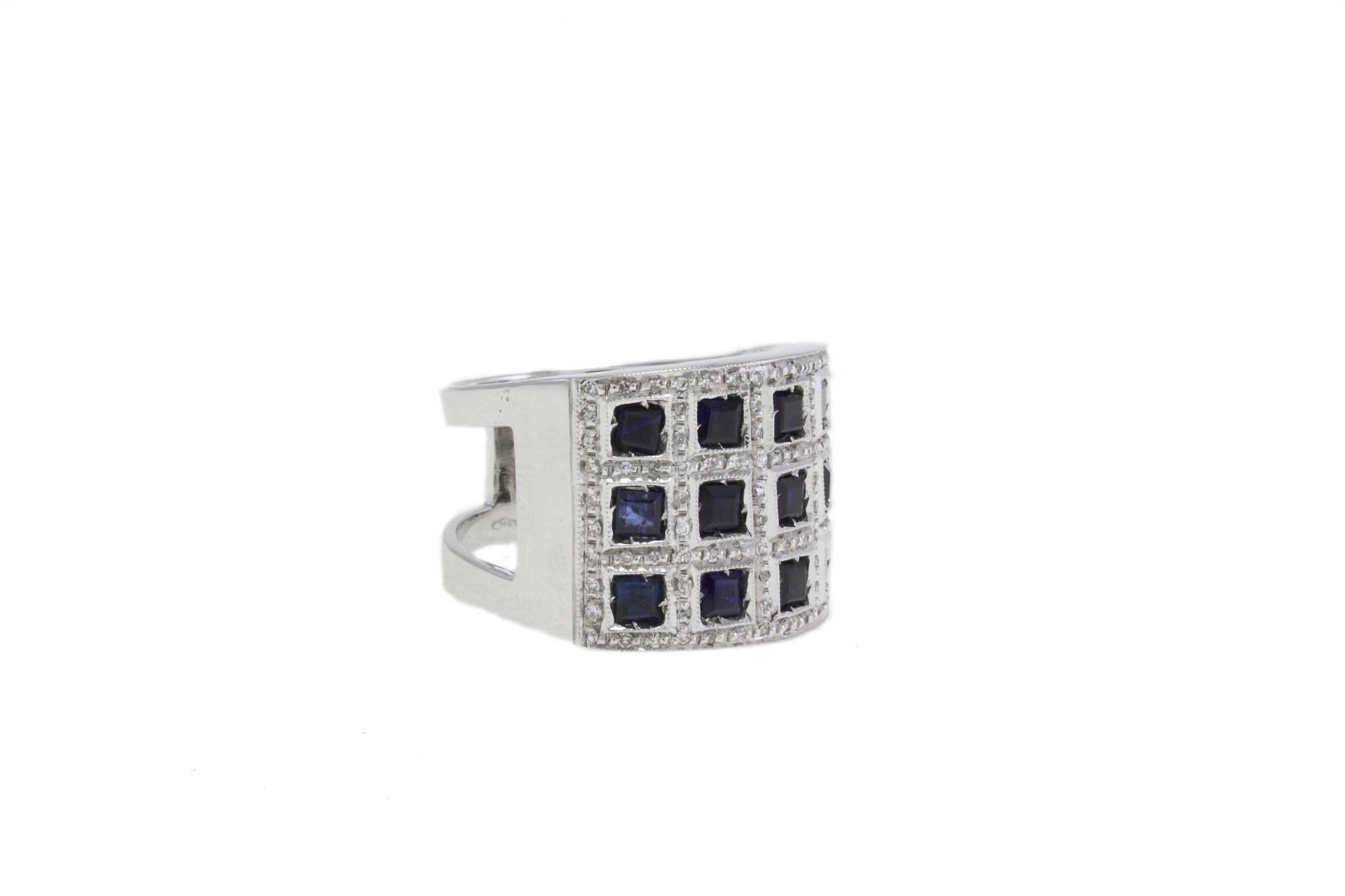 Sparkling ring in 14K white gold composede of encrusted blue sapphires and icy white brilliant-cut genuine diamonds. This dome ring displays a dizzying array of stones with breathtaking illumination! 

sapphires 3.59kt
diamonds 0.36kt
tot weight