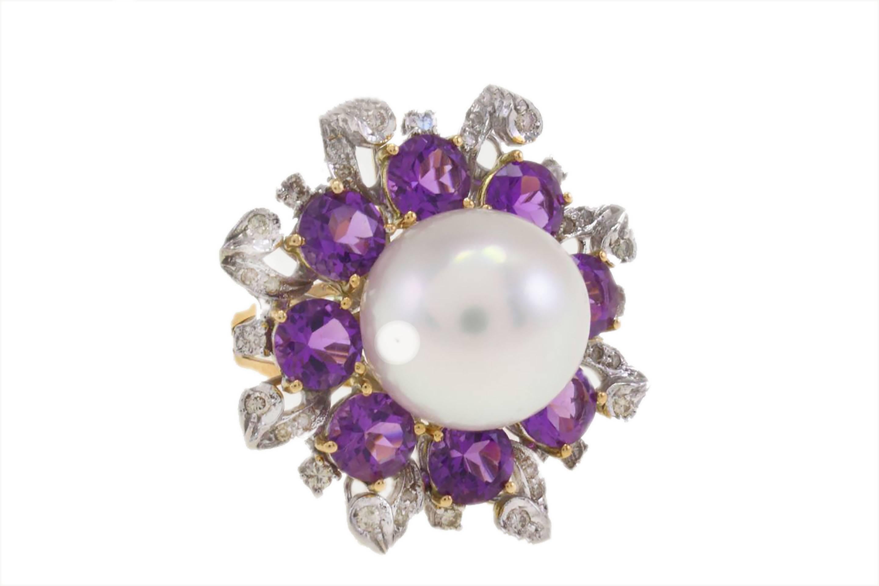 SHIPPING POLICY:
No additional costs will be added to this order.
Shipping costs will be totally covered by the seller (customs duties included).

Graceful ring remember in a 14Kt white gold composed of a large pearl in the center surrounded by