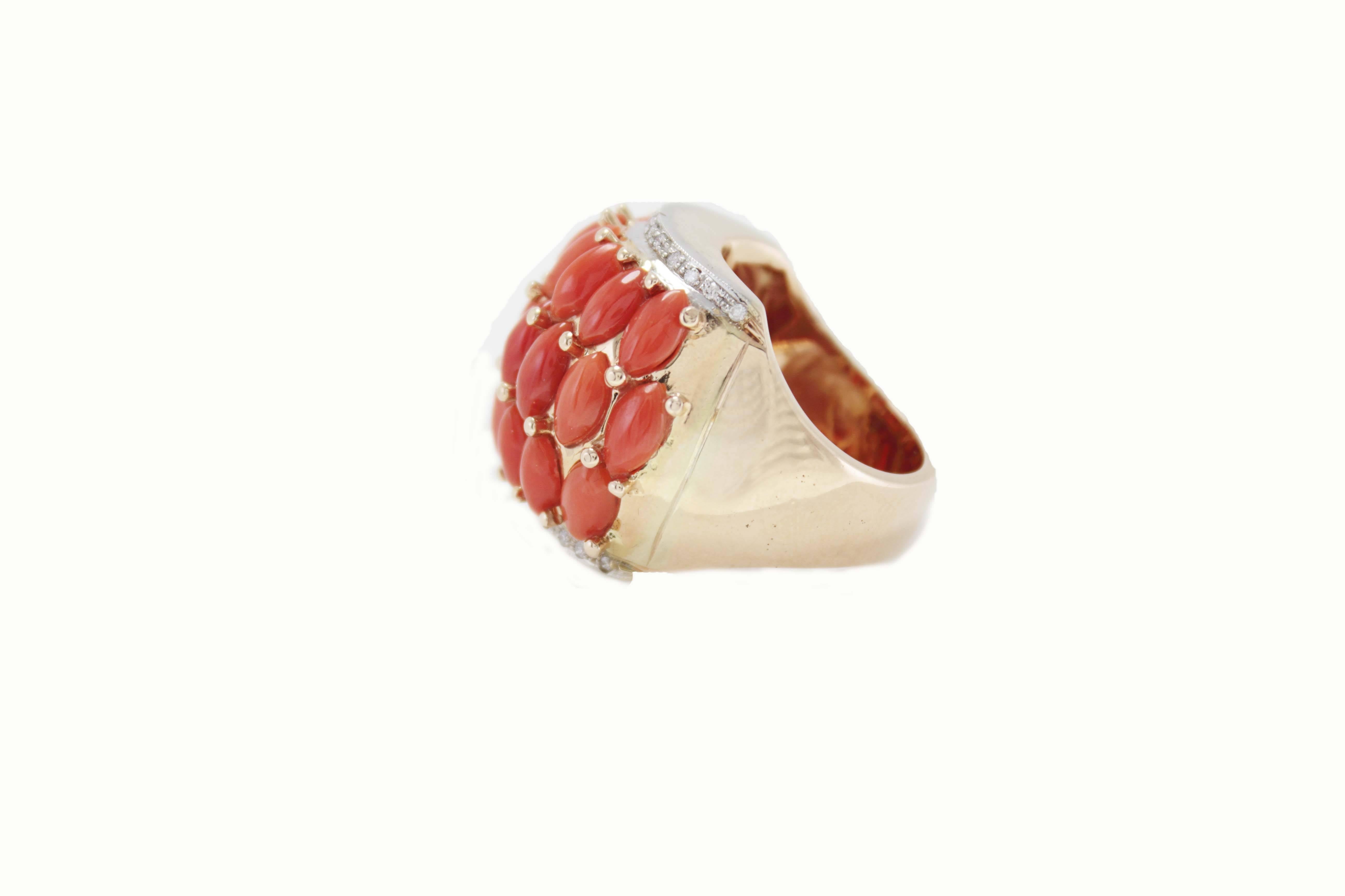 Evergreen ring in 14Kt gold composed of coral drops adornedof two single rows of diamonds.

coral drops (1.70gr) 
diamonds (0.29Kt). 
tot weight 19.8gr
Rf.442177