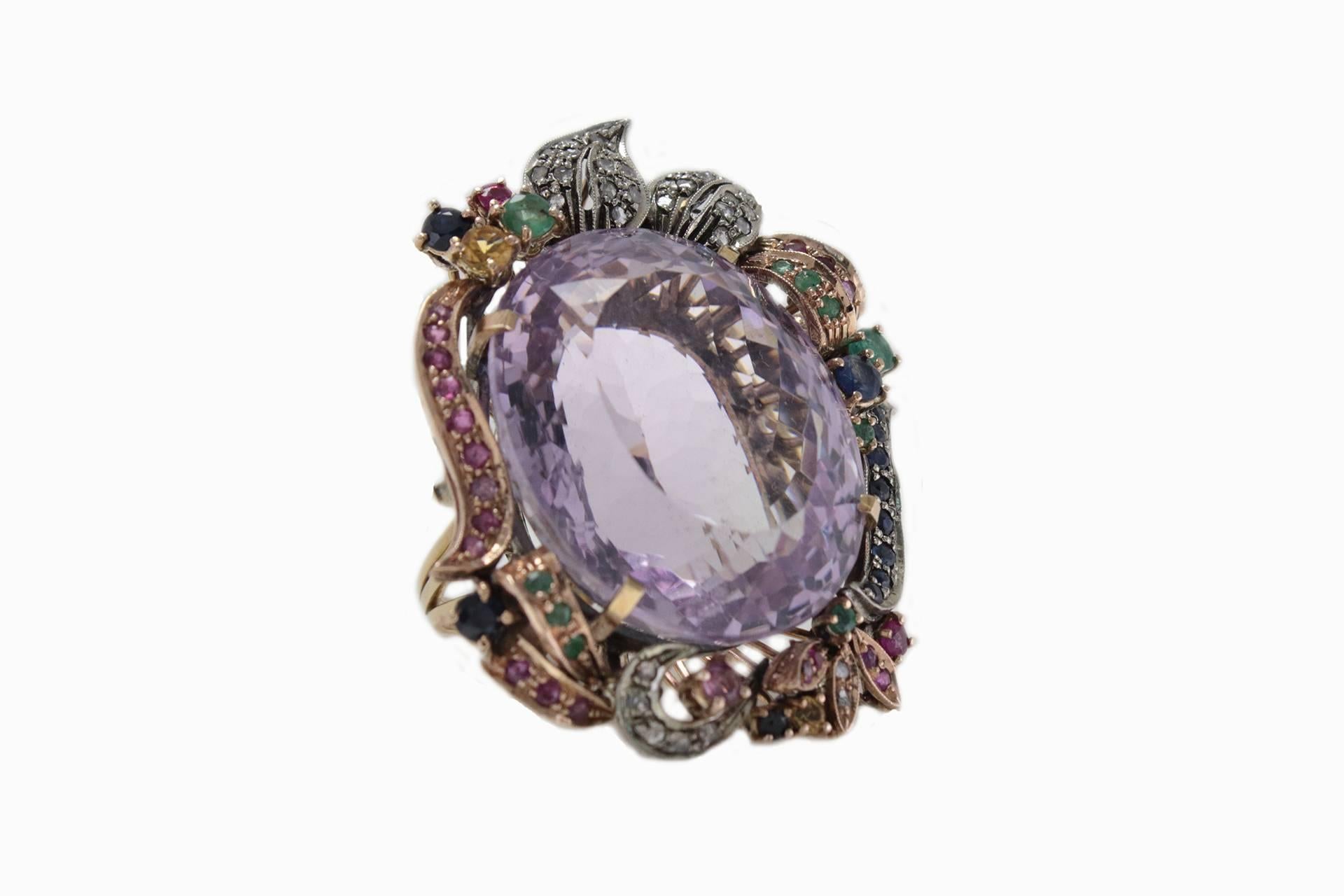 Bring a ray of light with you with this lustrous ring. Mounted on a base of 9Kt gold and silver there is a shining light purple topaz of 16.90 Kt,surround of diamonds(0.45Kt), emeralds, rubies, sapphires (tot. weight 4.93 Kt)
Rf. 228628