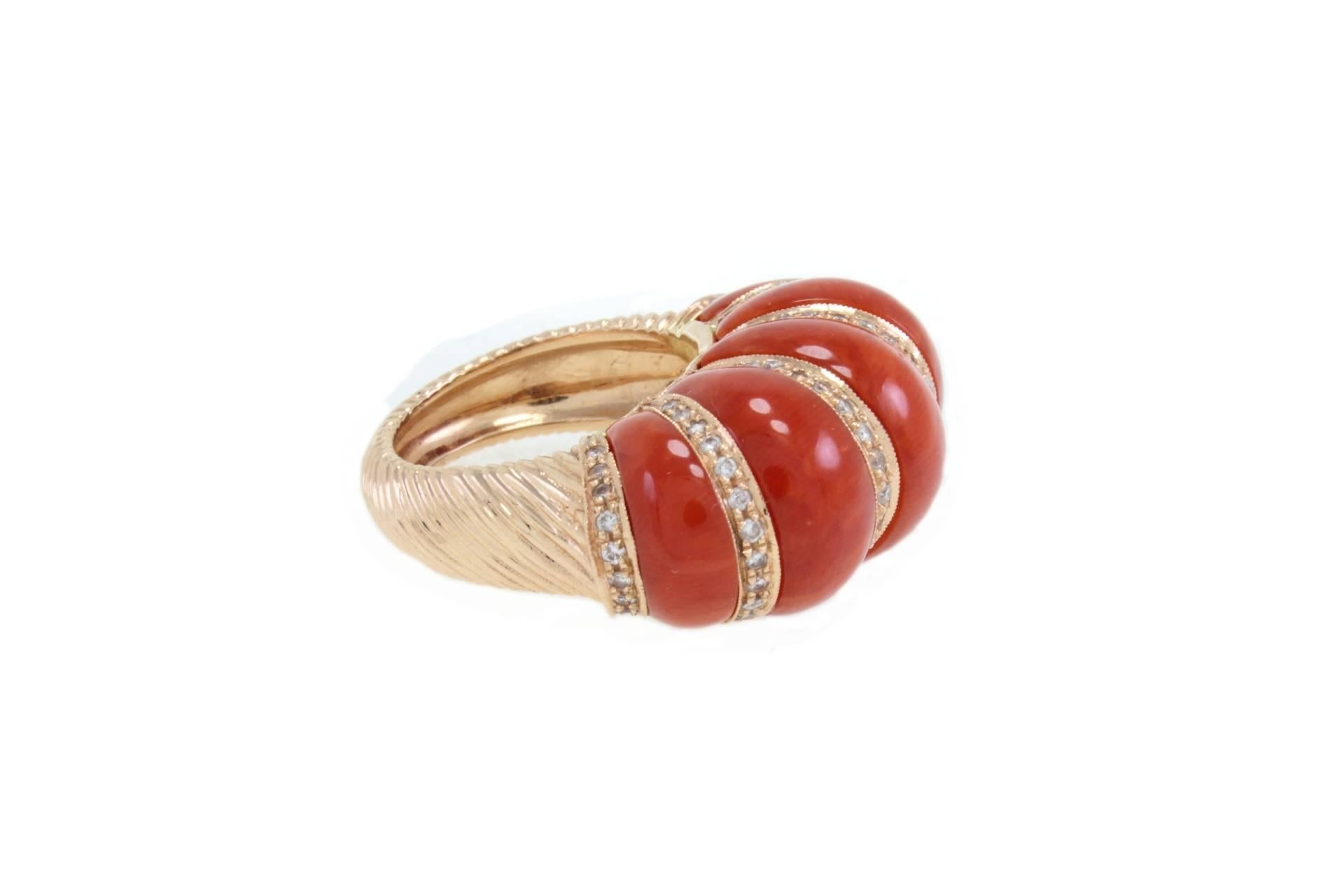 SHIPPING POLICY:
No additional costs will be added to this order.
Shipping costs will be totally covered by the seller (customs duties included).

Coral ring in14kt yellow gold with six diamonds strips.
diamonds ( 0.60 kt )
coral ( 5.90 gr ).
total