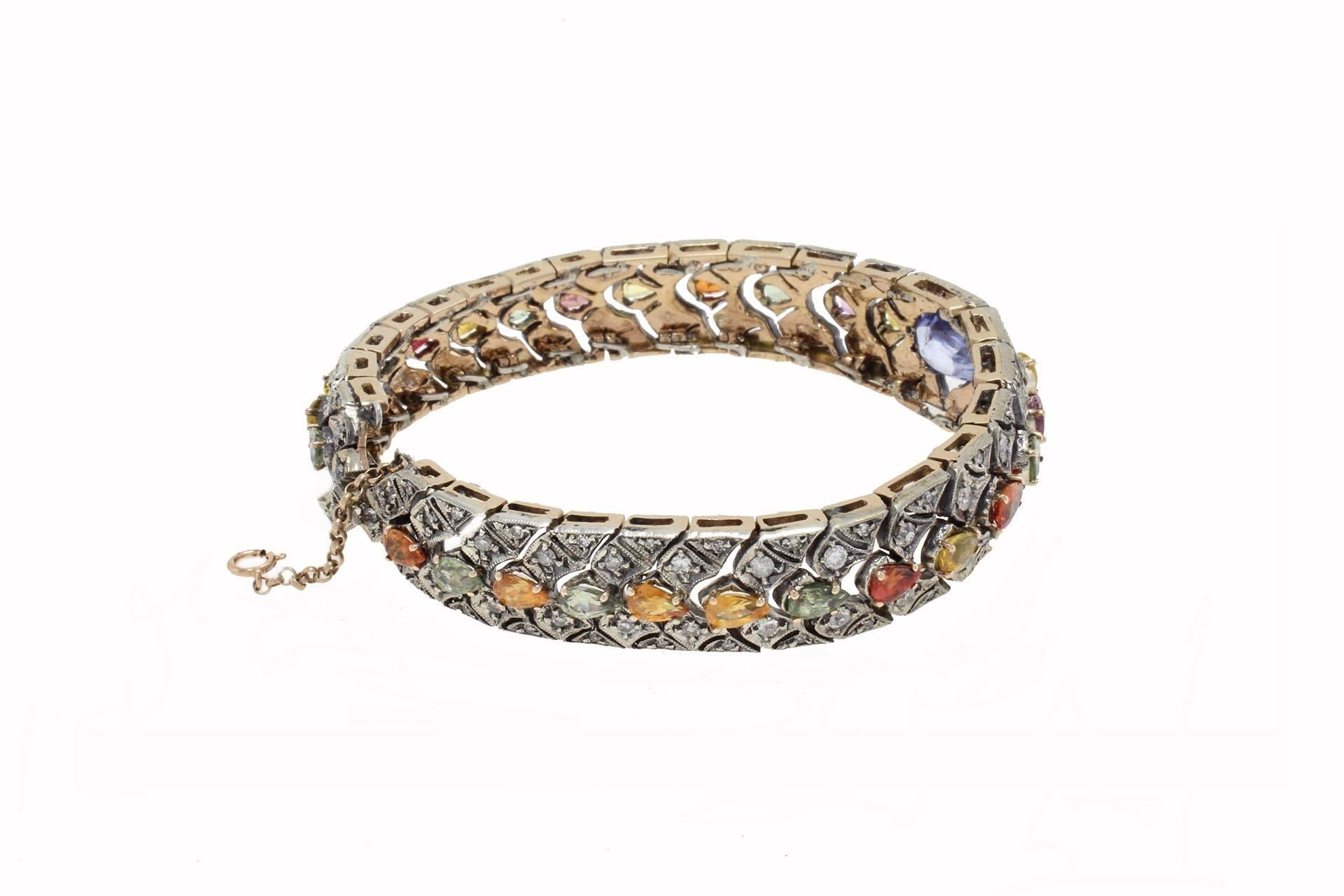 

Colored bracelet in 9Kt rose gold and silver covered in multicolor sapphires and diamonds.
sapphires (11.82Kt) 
diamonds (3.79Kt). 
Tot weight 35gr
Rf.474458 
For any enquires, please contact the seller through the message center.