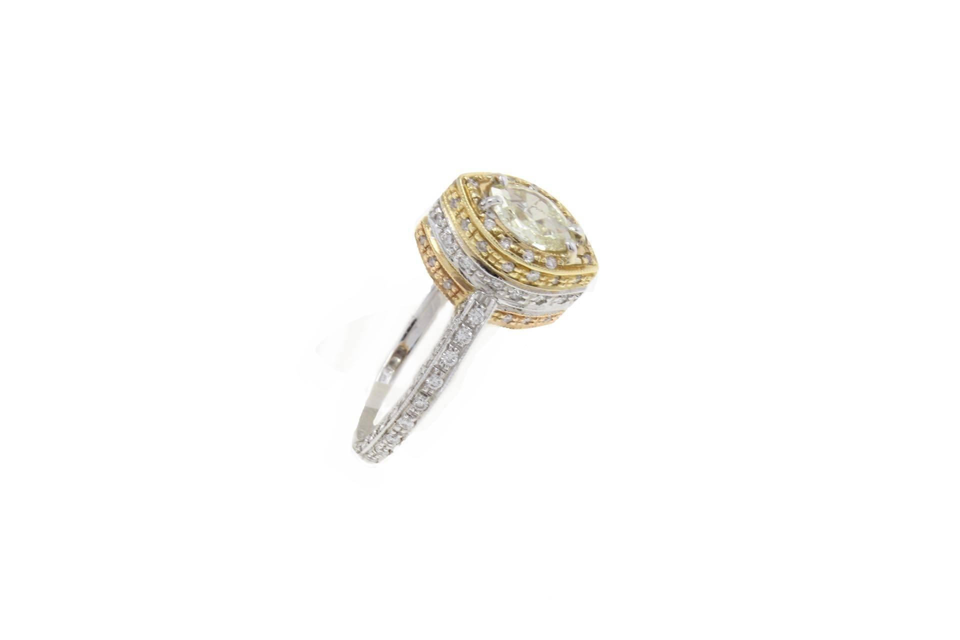 shipping policy: 
No additional costs will be added to this order.
Shipping costs will be totally covered by the seller (customs duties included). 

Shiny ring in 18 kt rose gold, white gold and yellow gold. This ring is mounted with diamonds