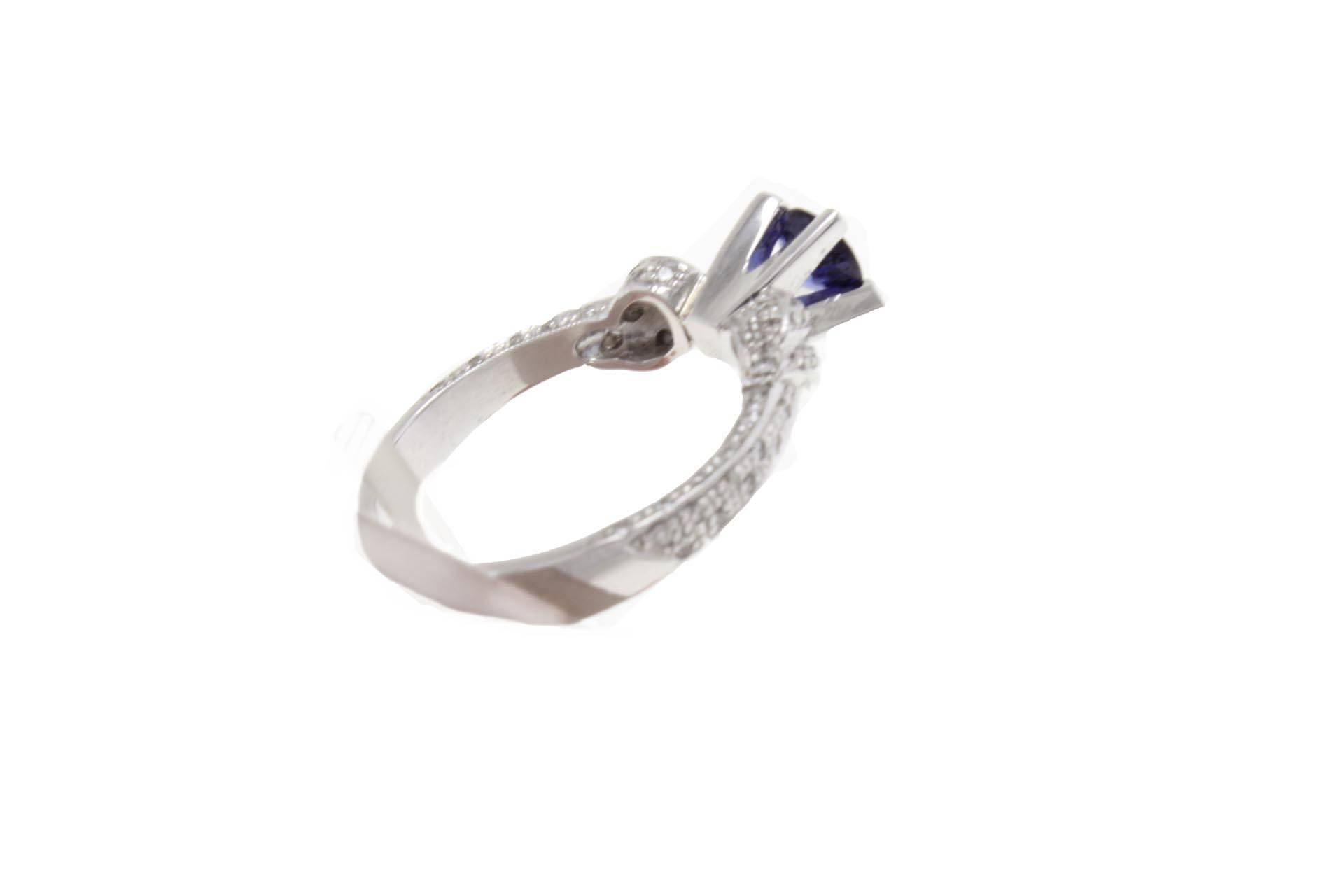 Modern Sapphire Diamonds 18 Karat White Gold Ring For Sale