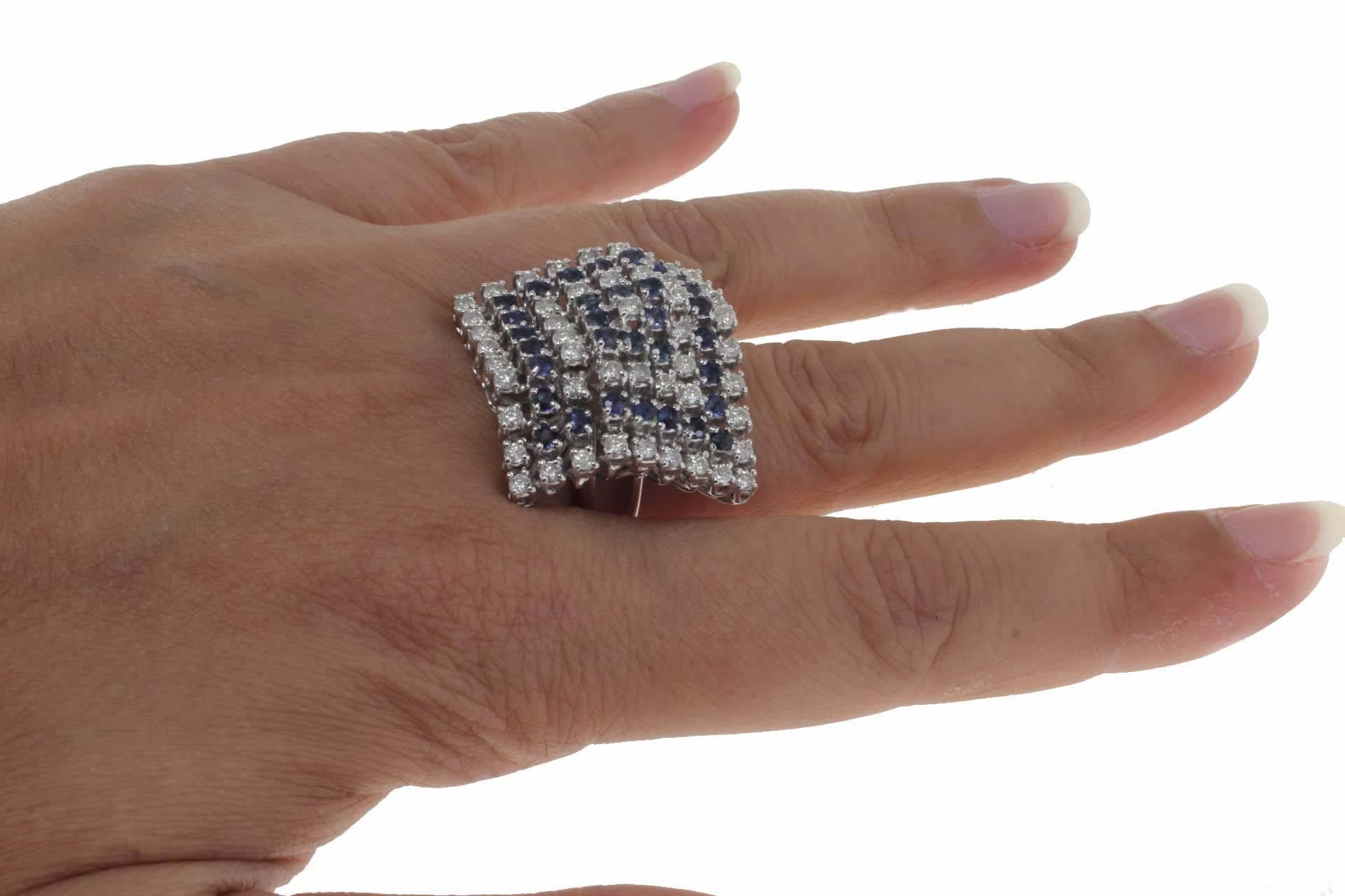 Brilliant Cut  Pyramid of Blue Sapphires and Diamonds White Gold Cluster Fashion Design Ring For Sale