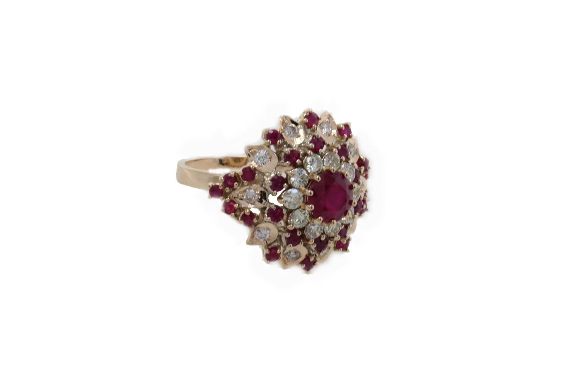 shipping policy: 
No additional costs will be added to this order.
Shipping costs will be totally covered by the seller (customs duties included). 

Charming ring in 14Kt gold composed of a ruby in the center surrounded by diamonds and