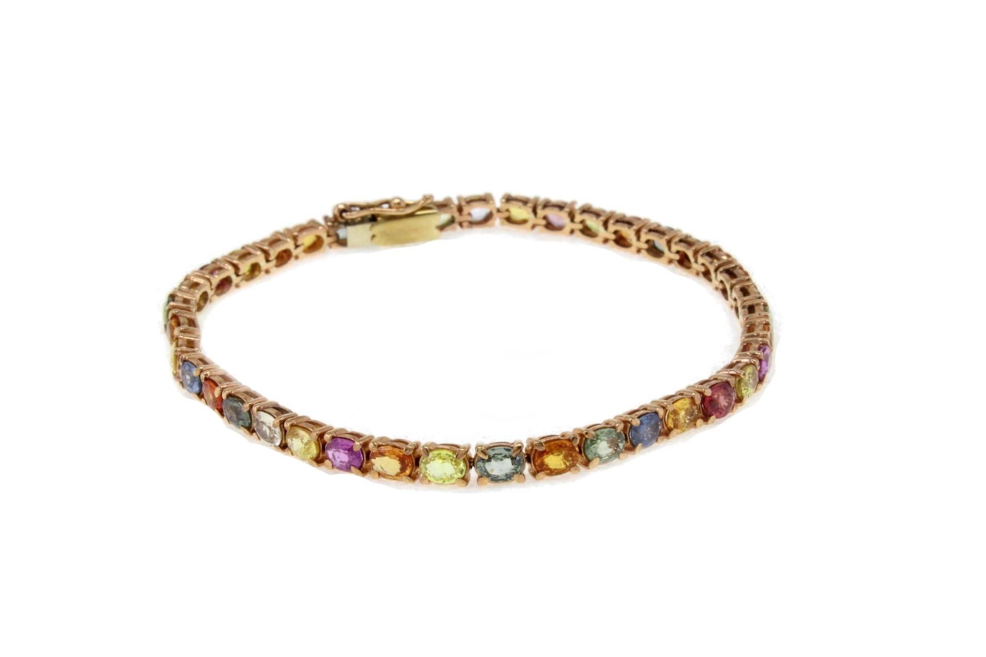 9kt rose gold bracelet mounted with yellow sapphires, blue sapphires, red sapphires, green sapphires, pink sapphires.
Multicolor Sapphires 9.27 kt
Tot.weight 9.80 gr
R.F gfoo