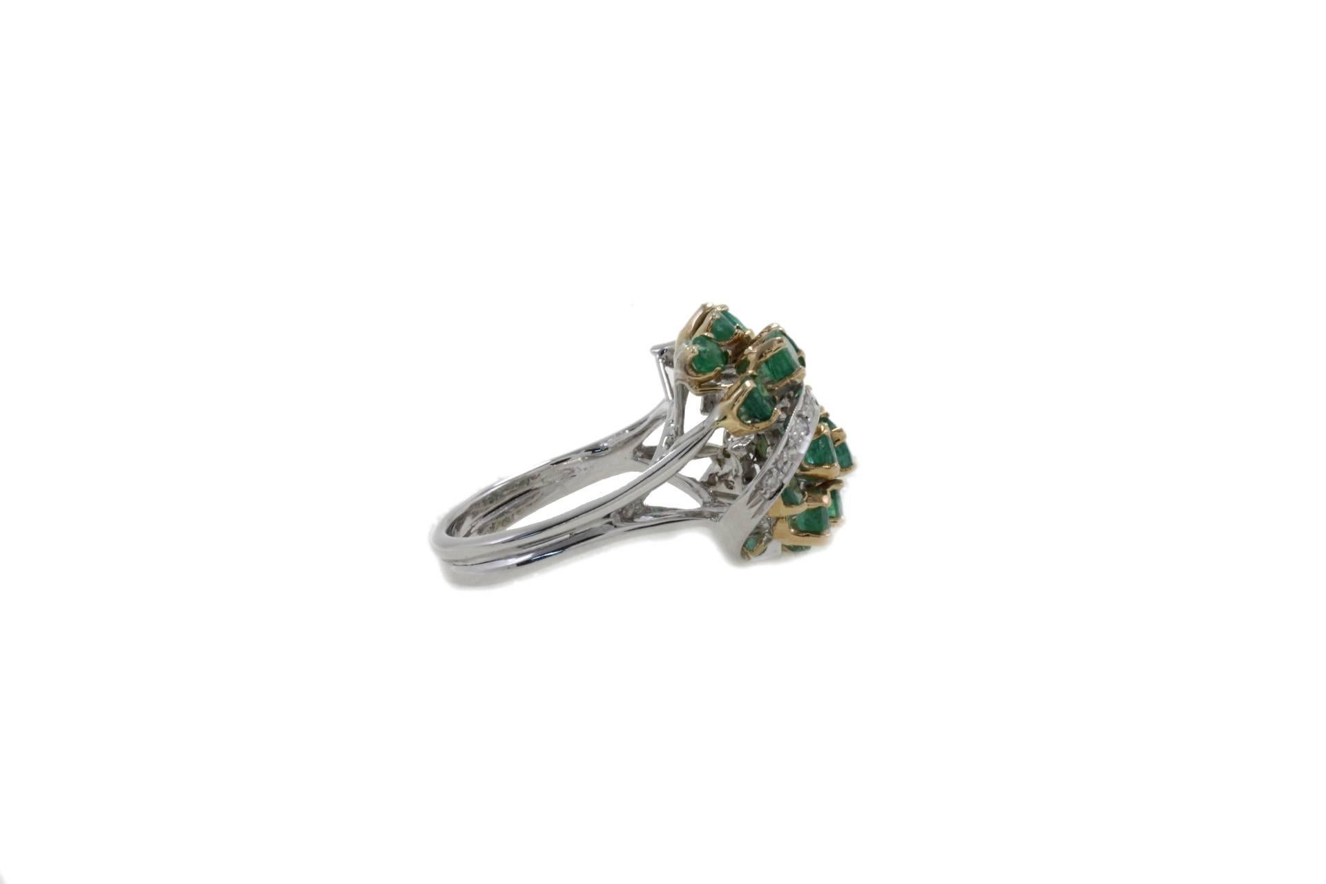 Cluster ring in 14k yellow and white gold mounted with diamonds and emeralds.
Diamonds 0.28 kt
Emeralds 4.06 kt
Tot.Weight 9.50 gr
R.F uhio