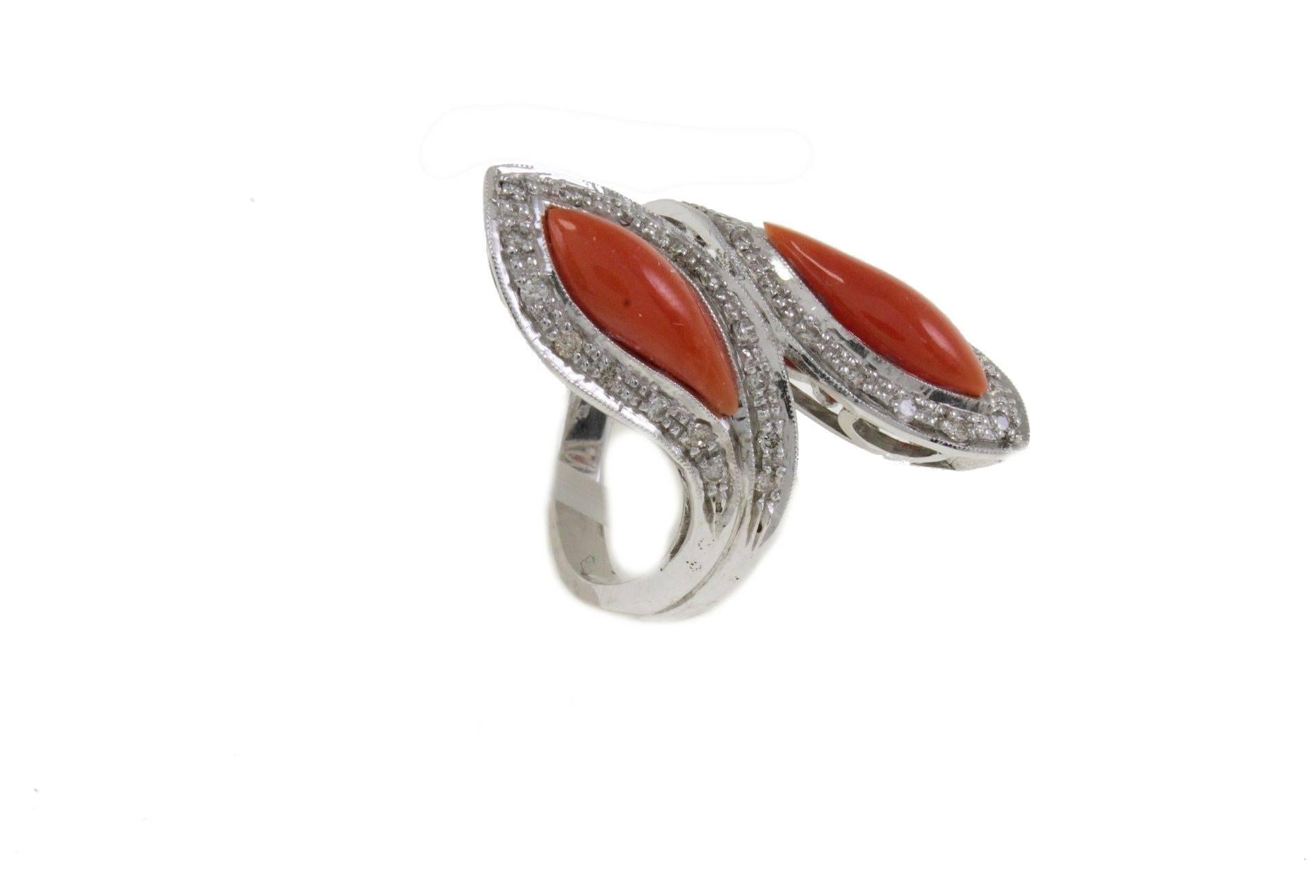 Fashion ring in 14k white gold mounted with white diamonds and coral.
Diamonds 0.47 kt
Coral 0.60 gr
Tot.Weight 10.90
R.F ghra

For any enquires, please contact the seller through the message center.