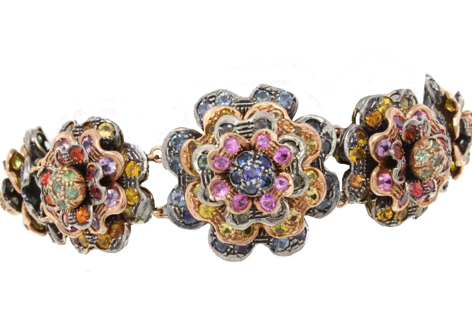 A lush of Spring with this multiflowers bracelet embellished with multi-colored sapphires. All in 9Kt gold and silver.
sapphires(39.00Kt)
Tot weight 81.5 gr.
R.f. 133384

For any enquires, please contact the seller through the message center.