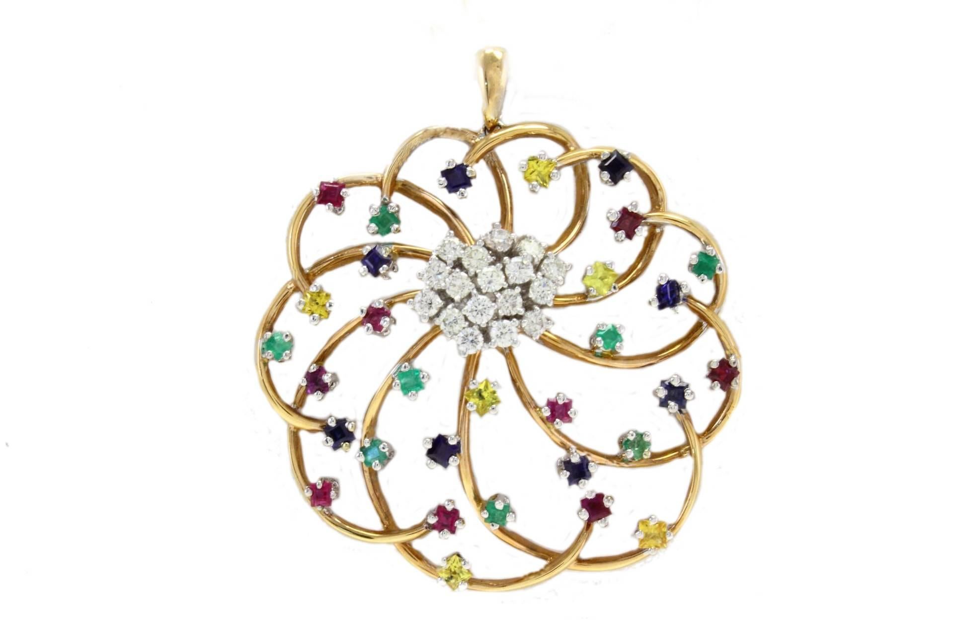 Stylized flower pendant in 18kt yellow and white gold composed of a diamond cluster in the center surrounded by blue and yellow sapphires, rubies and emeralds at the end of every gold petal.

diamonds 0.92kt
sapphires, rubies and emeralds 3.20kt
tot