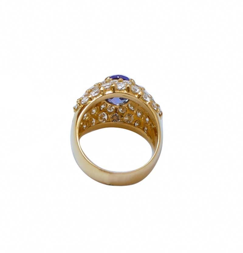 Rétro Anello con tanzanite, diamanti e oro giallo 18 carati. in vendita