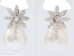 Pendientes de perlas, diamantes y platino.