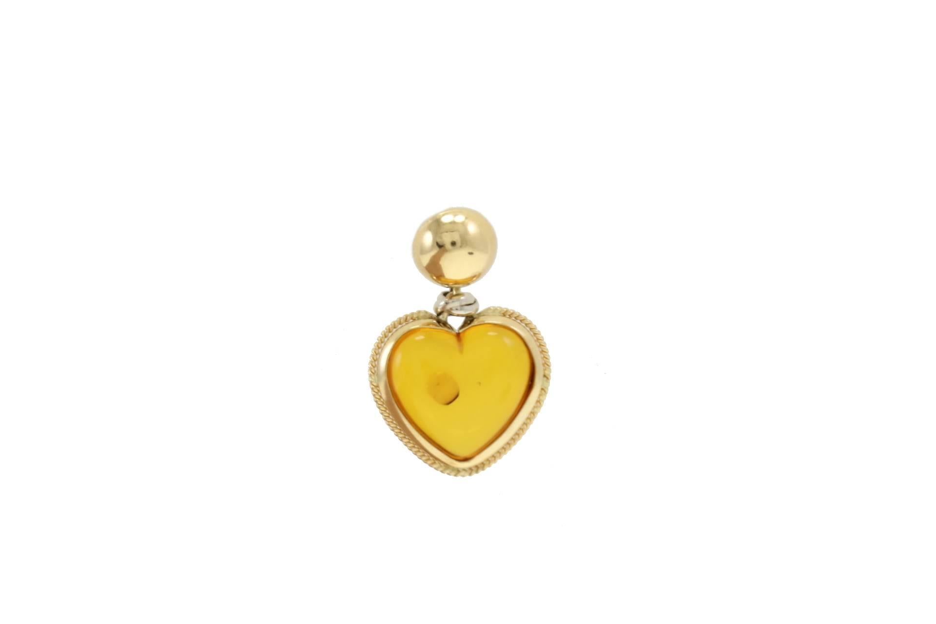 Heart shaped amber earrings in 18kt yelow gold.

tot weight 12.4gr
r.f.  efa