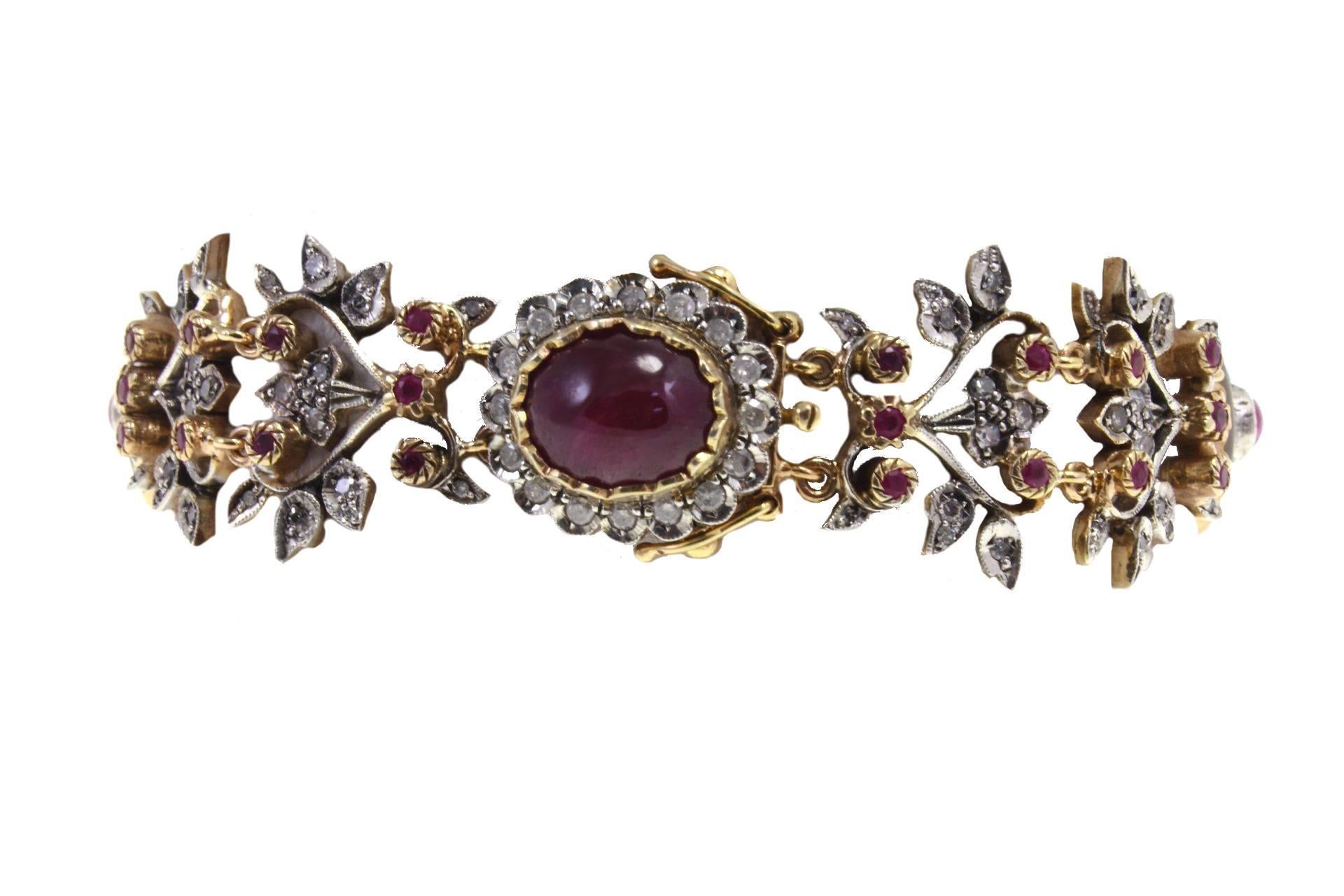 Retro bracelet in 9kt yellow gold and silver composed of three rock crystal disks with a flower of diamond and rubies on them, all embellished with diamonds and rubies links.

diamonds 4.85kt
rubies 9.70kt
tot weight 44.8gr
r.f.  huiu