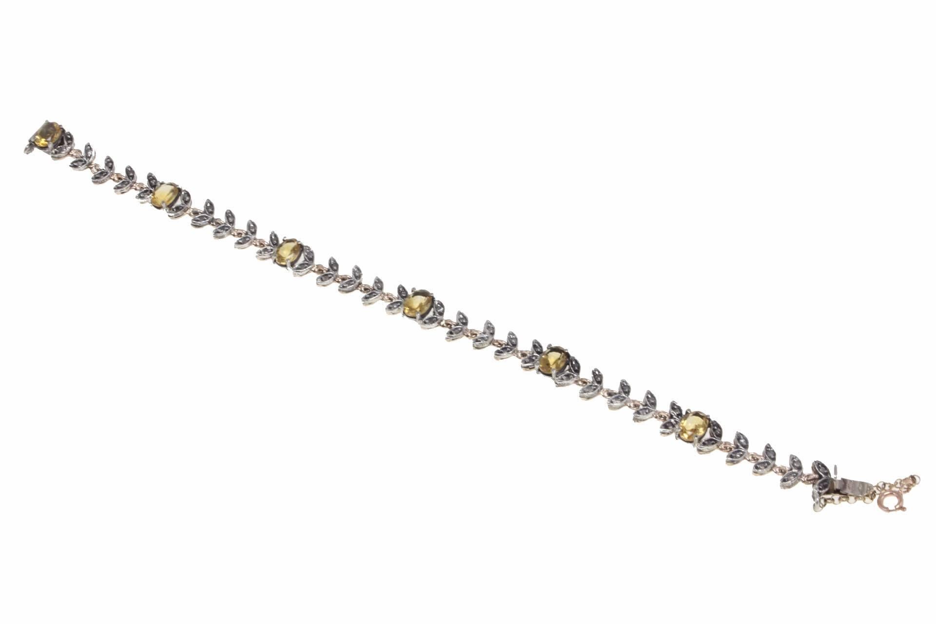 

This charming link bracelet it was created in 9 kt rose gold and silver, it is composed of 6 oval topazes that are linked with leaves of diamonds among them.
Tot weight 12.8 gr
Diamonds 0.46 Kt
Topazes 4.69 Kt
Rf. rrg

For any enquires, please