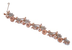 Bracelet « Carriage » en émeraudes, saphirs, diamants, or rose et argent.