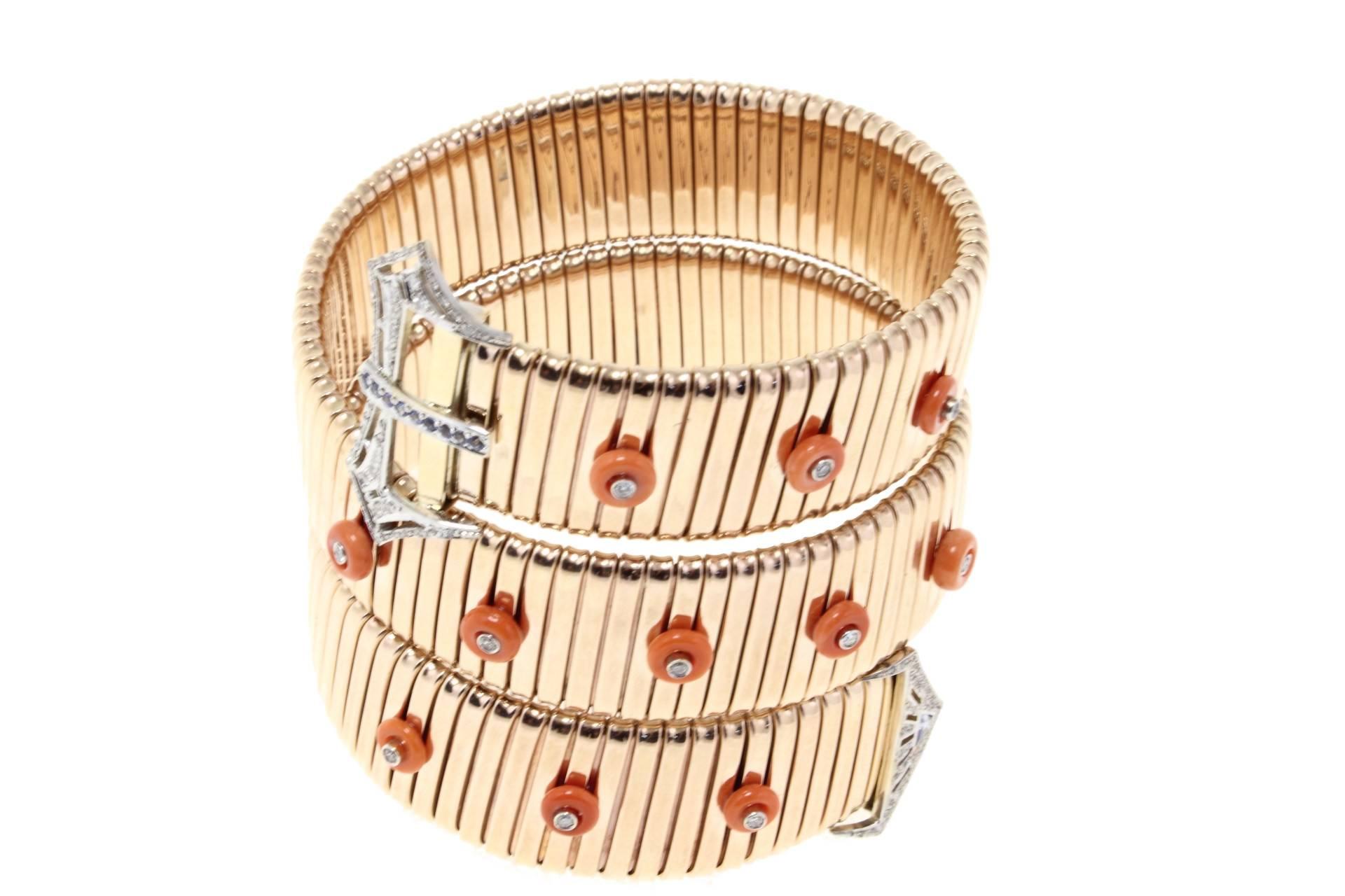 Tubogas bracelet in 14kt rose gold embellished with corals and diamonds. The clasps are covered in diamonds and blue sapphires.

tot weight 83.5gr
r.f.    gaooi