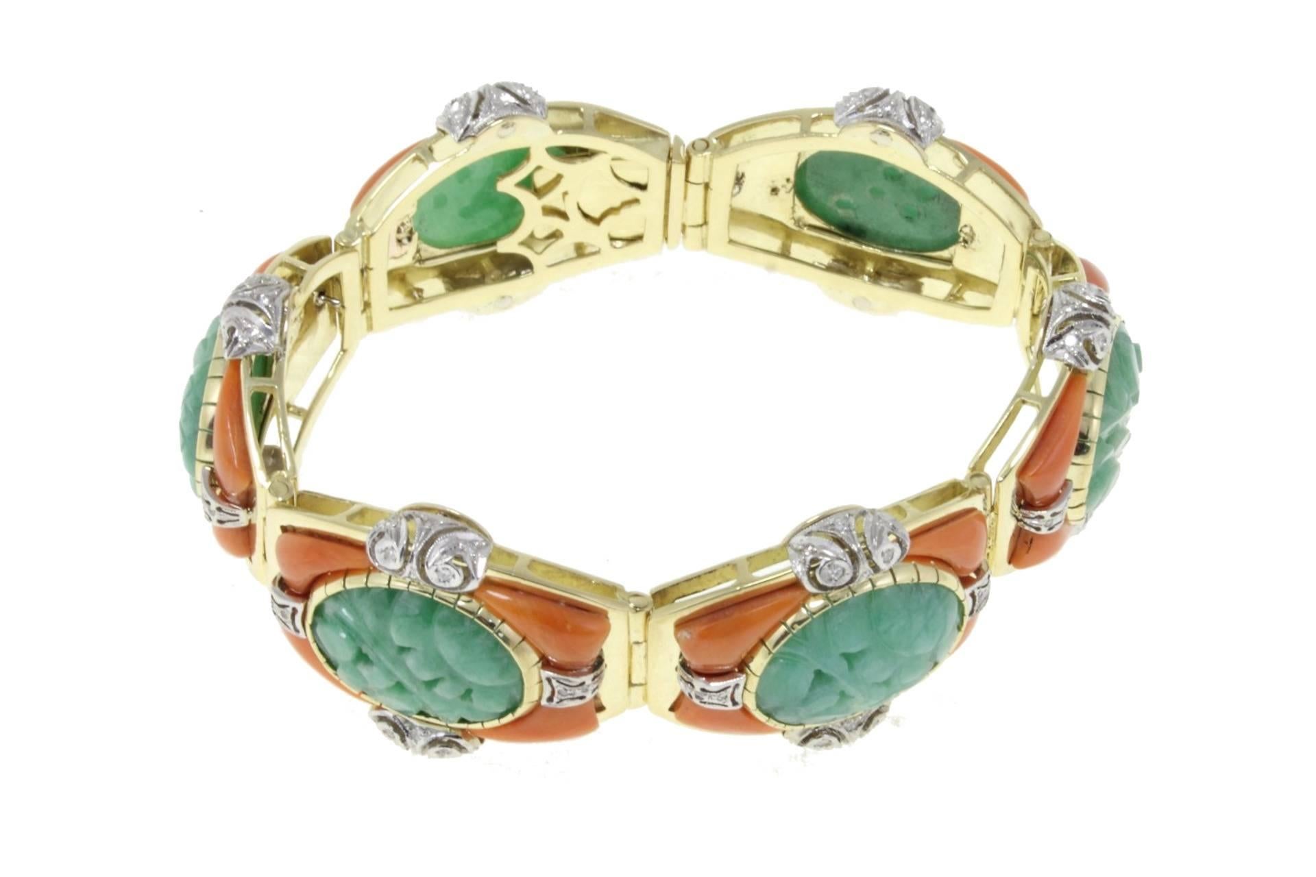 Breathless bracelet in 18 kt yellow and white gold composed of six links of a central green jade surrounded by coral and embellished with diamonds. 

tot weight 80.7gr
R.F geefg