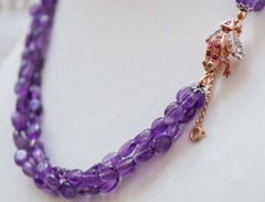Collana con ametiste, rubini, diamanti, oro rosa e argento.