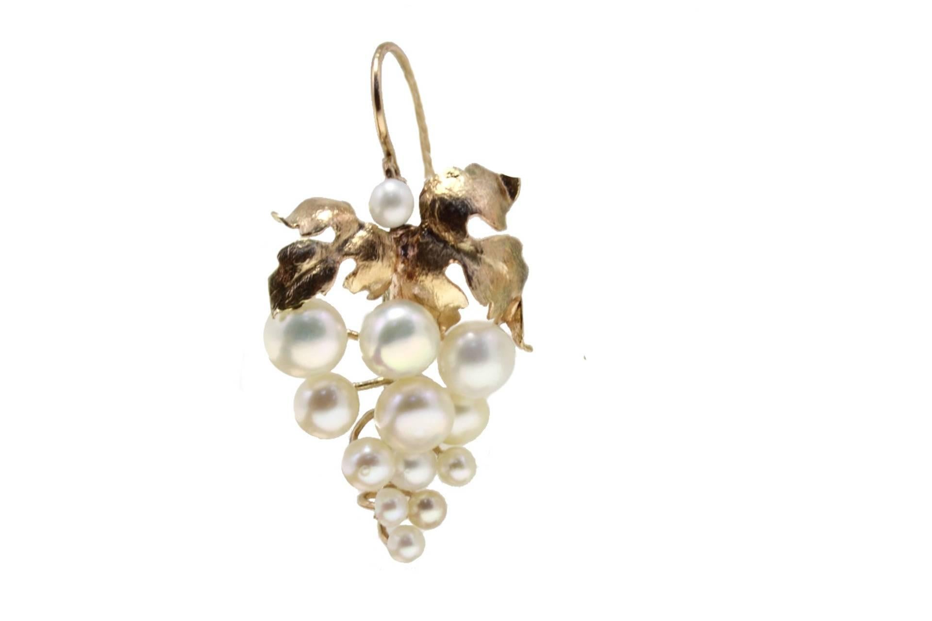 Pearls grape bunch earrings in 9kt rose gold.

tot weight 8.0gr
r.f.  eio
