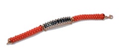 Bracelet en corail, saphirs, diamants, or rose et argent.