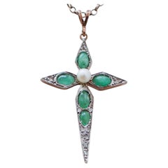 Diamonds, Emeralds, Pearl, Rose Gold and Silver Cross Pendant.