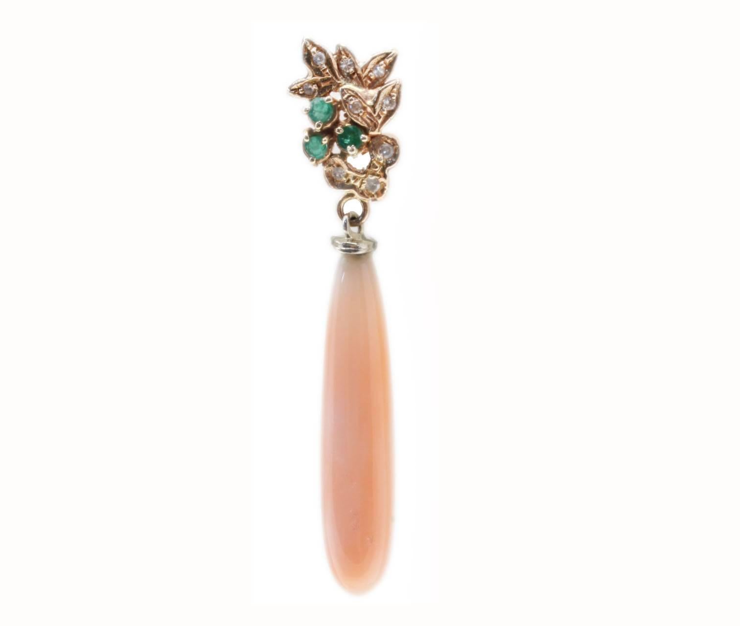 Charming  coral drop earrings, composed of diamonds and emeralds on top of a light pink coral drop, all is mounted in 14K rose gold.
Tot weight 5.6 g both earrings, single one 2.8 g
Diamonds 0.16 ct
Emeralds 0.26 ct
Coral 3.20 g

Rf. rgf