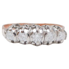 Anello con diamanti, oro rosa e argento.