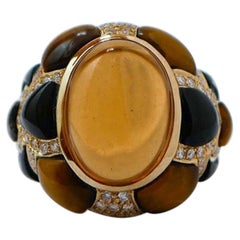 Stones, Diamonds, 14 Karat Yellow Gold Ring.