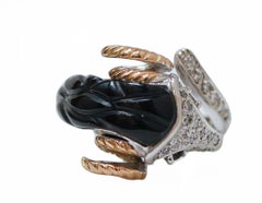Ring im Sternzeichen Widder aus schwarzem Achat, Diamanten, 14-karätigem Weißgold und Roségold.