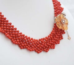 Collar de coral, topacio, rubíes, perlas, oro rosa y plata.
