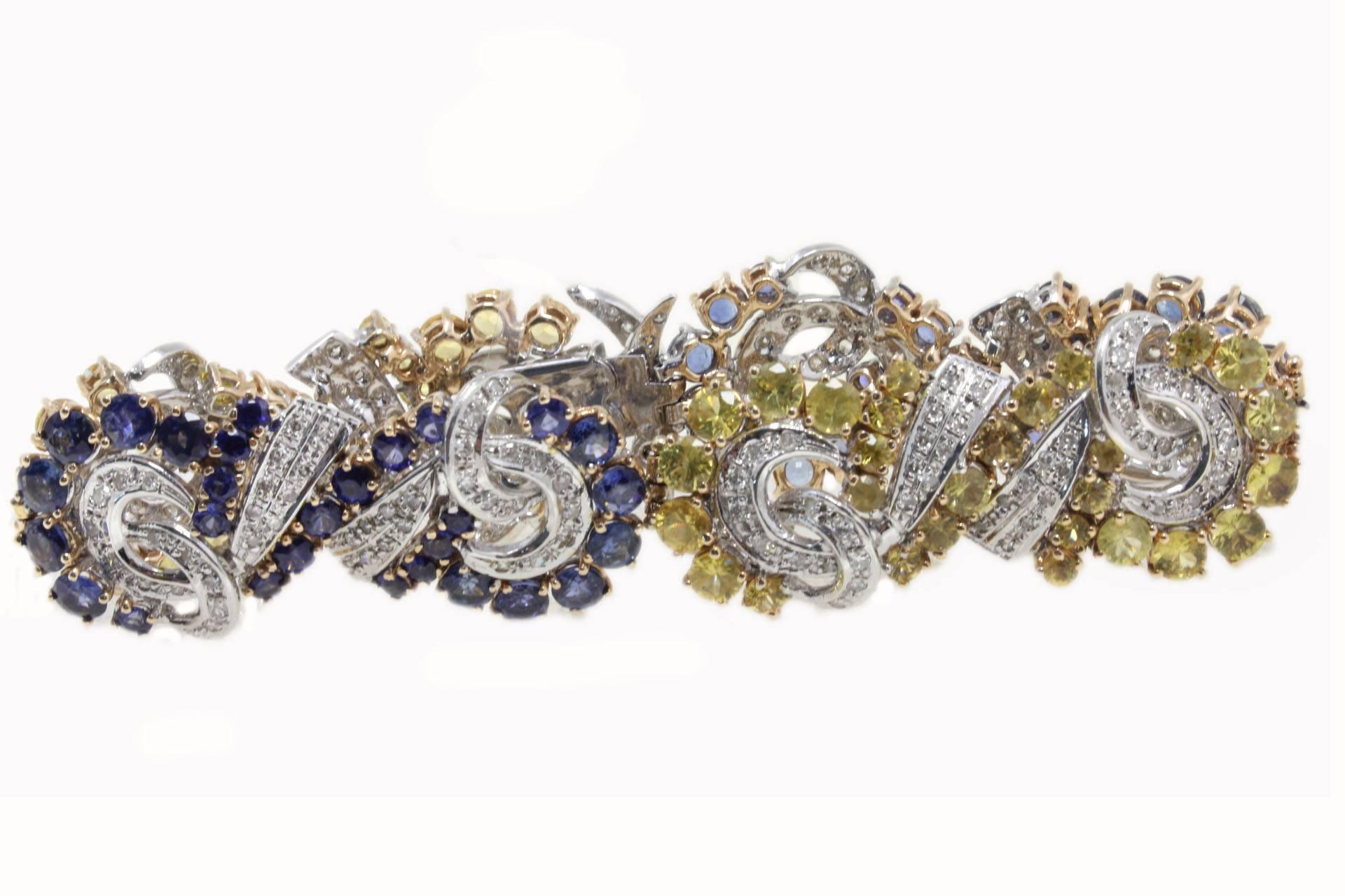 The particular design of this bracelet, make it really a must of the retro style. All is mounted in 14 Kt white gold and 14 Kt rose gold, encrusted on it the it yellow sapphires and blue sapphires that's  alternating with shiny diamonds.
Tot weight
