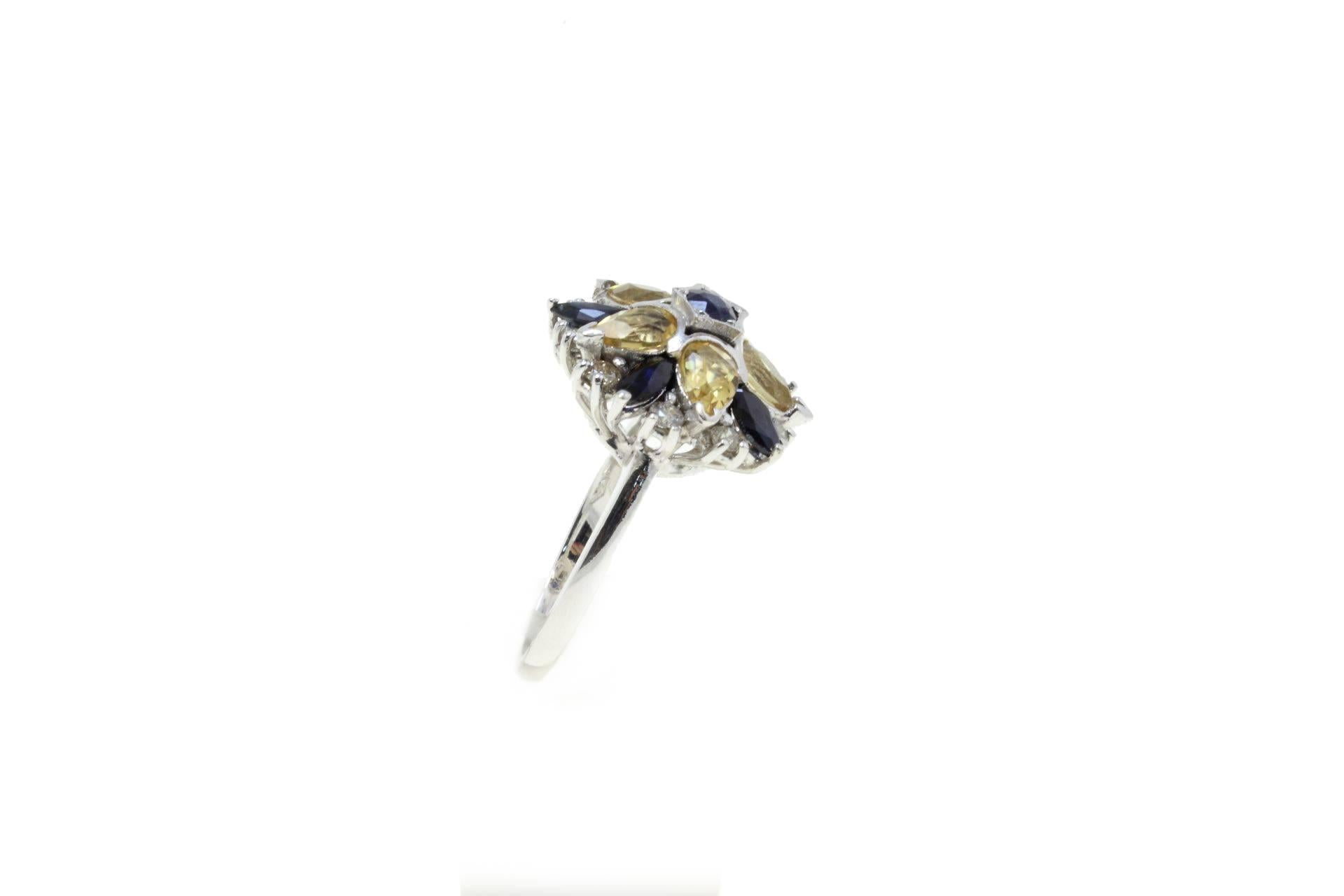 

Flower fashion ring in 14kt white gold mounted with diamonds, topaz yellow and blue sapphires.
Diamonds ct 0.70
Topaz yellow ct 2,00
Sapphires (blue) ct 3.57
Tot.weight gr 7.70
R.F ggir 
For any enquires, please contact the seller through the