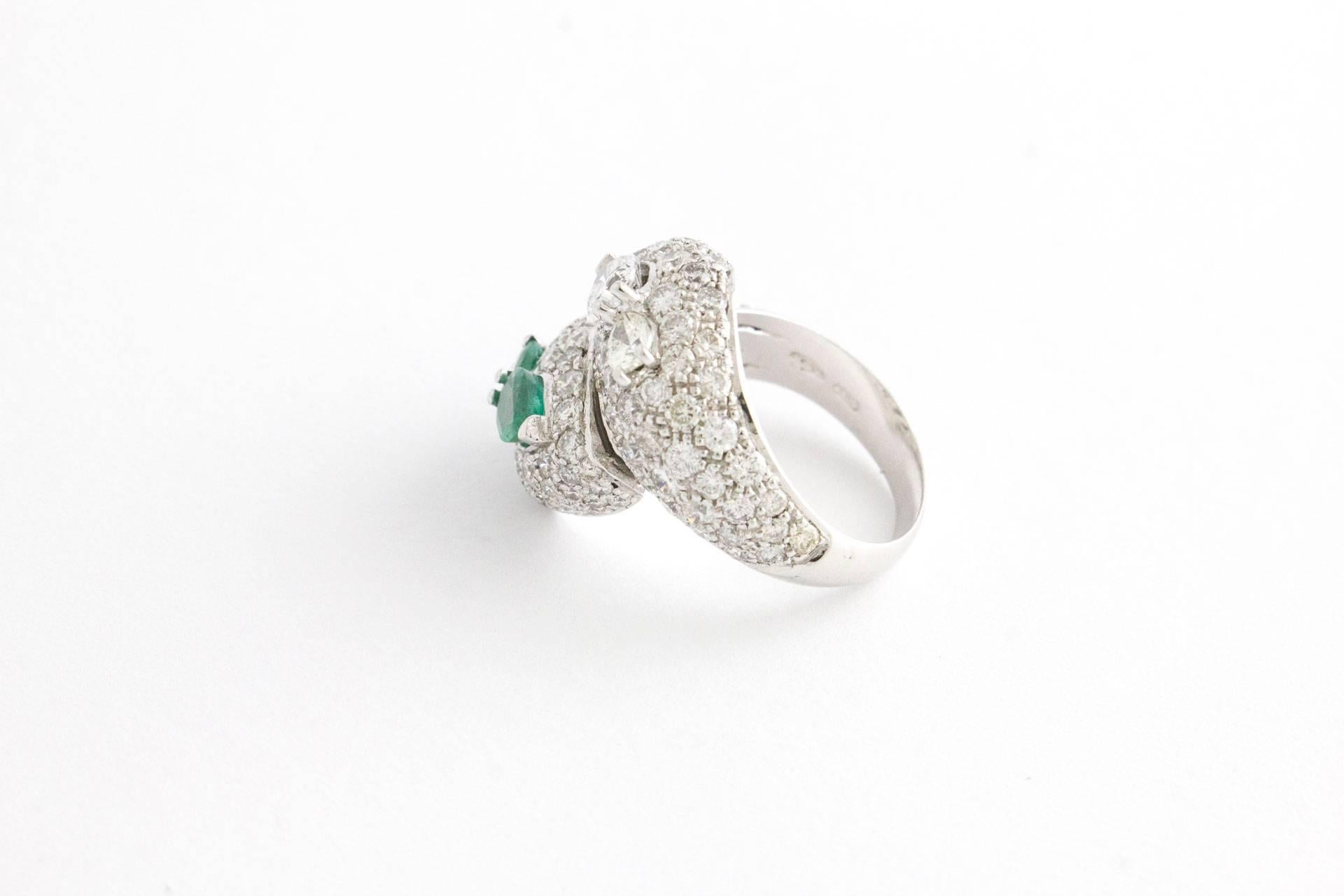 Brilliant Cut Diamond Emerald Crossover Ring For Sale