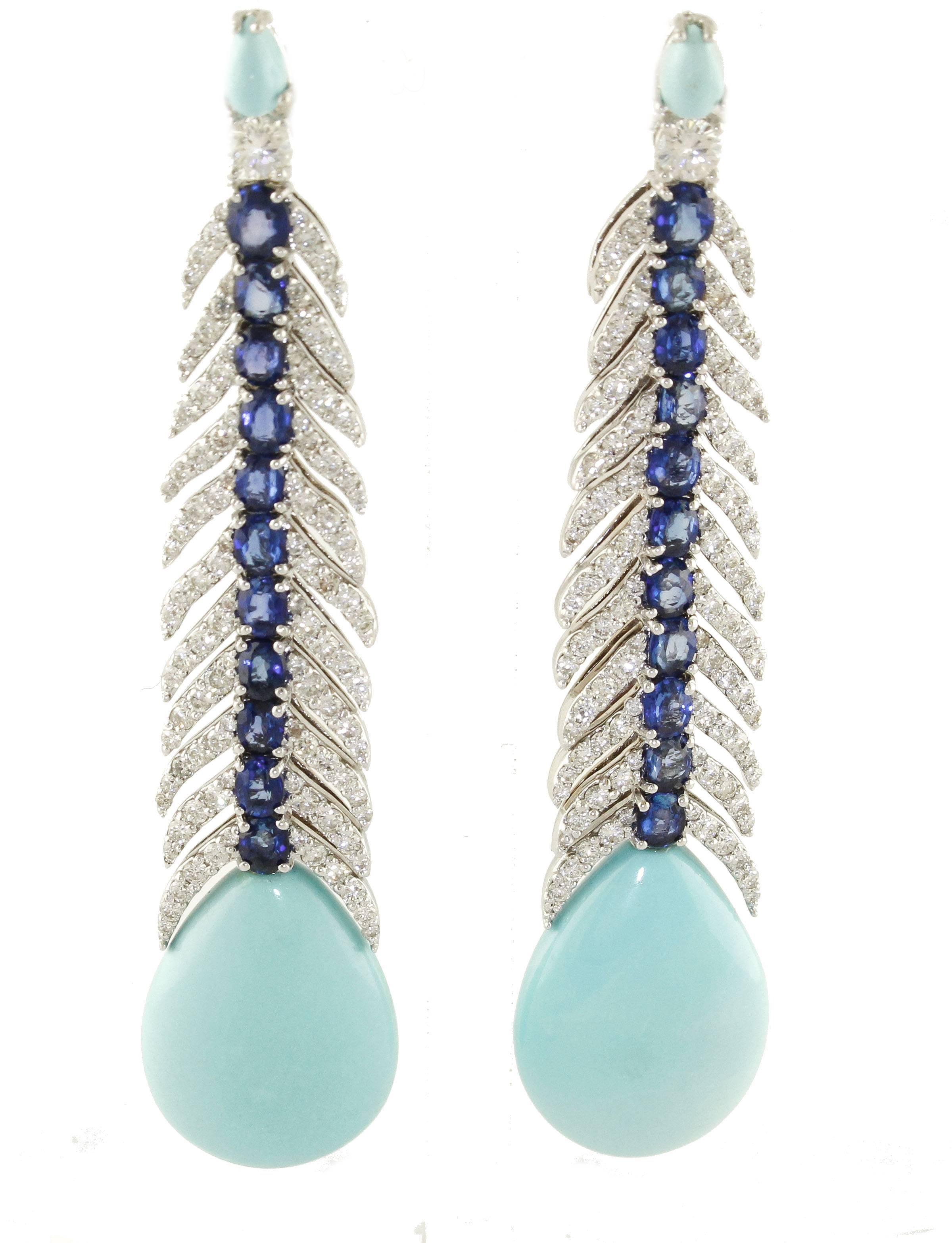 Dangle Earrings in 14Kt of White Gold,  with Diamonds, Sapphires and Turquoise 
Diamonds ct 4.02
Sapphires ct 6.07
Turquoise 7.90 gr
Total Weight 25 gr

R.f. ggoao