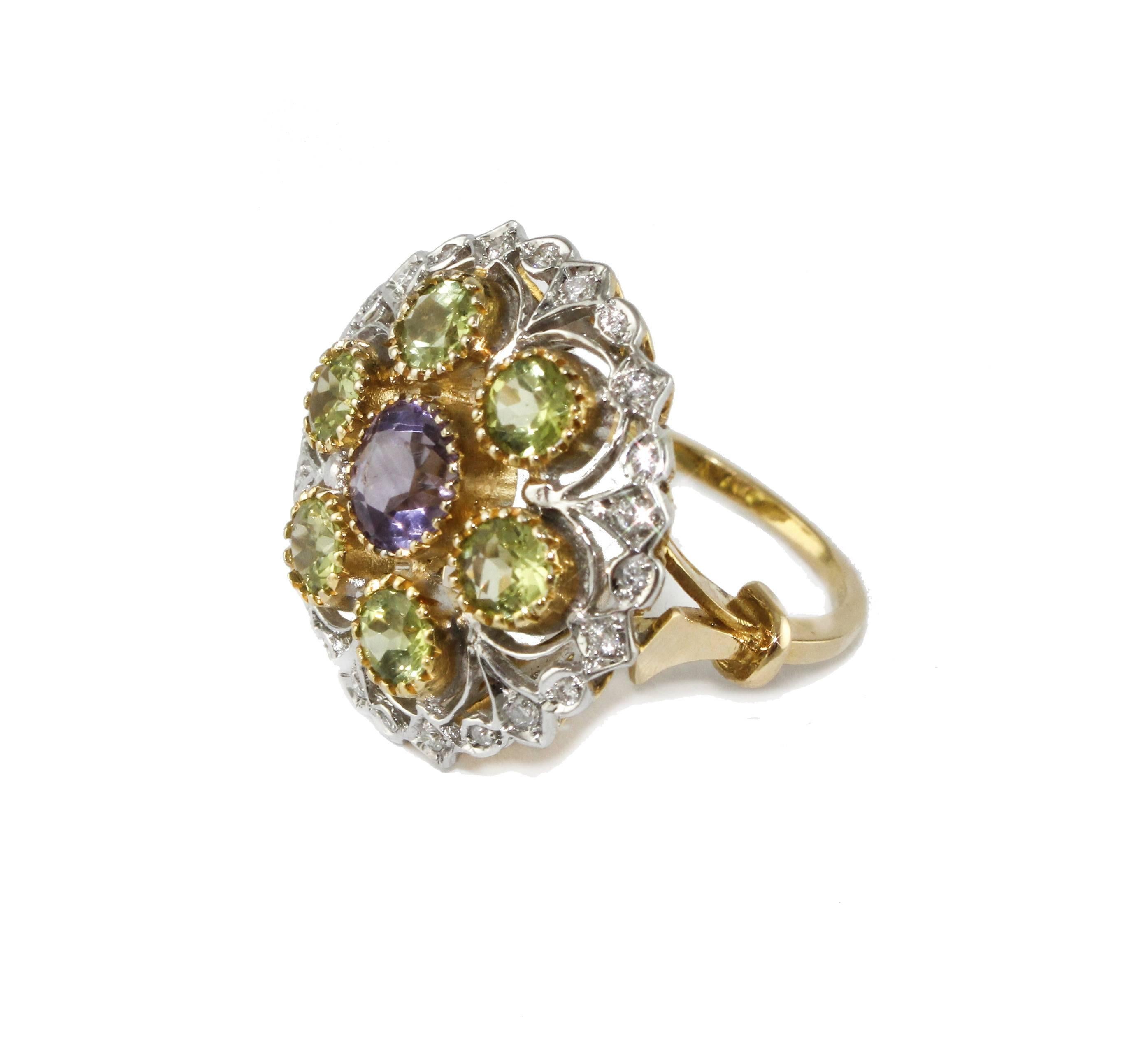 Charming ring in 18 kt white and yellow gold, g 11.10, surrounded by diamonds 0.25 ct, tsavorite and amethyst from ct 2.56.
Diamonds ct 0.25
Tsavorite Amethyst ct 2.56
Total weight g 11.10
Size eng 16.50
Size franc 56.50
Size usa 7.75
R.F