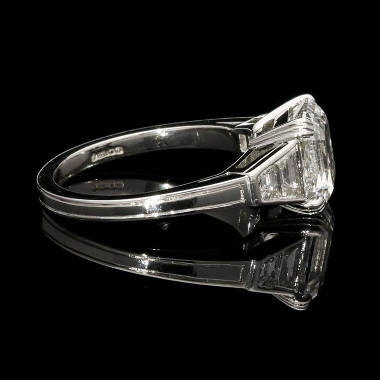 A 3.31ct Asscher Cut Diamond Ring With Graduated Trapezoid Shoulders By ...
