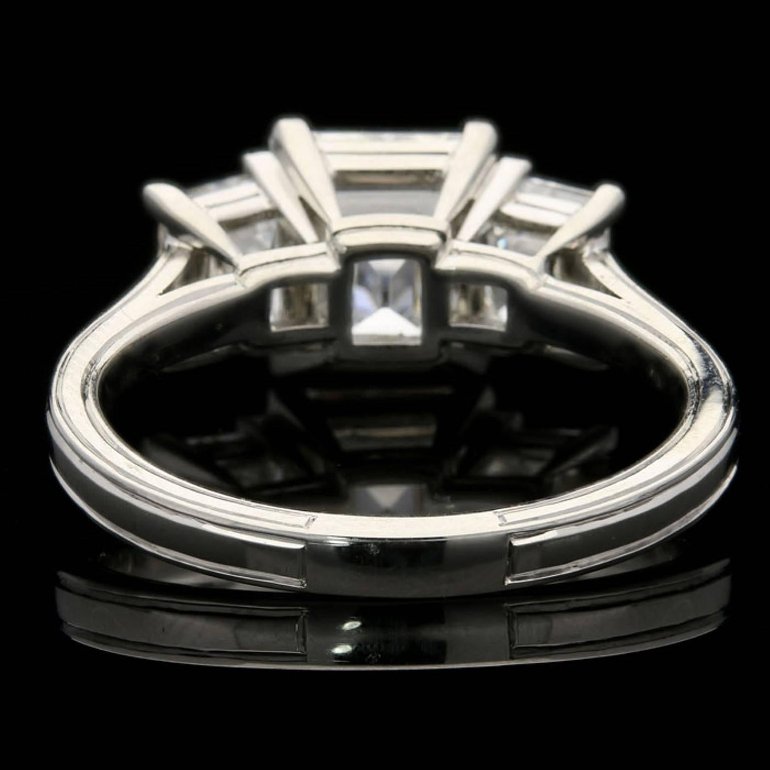 An Elegant 3.63 Carat Three Stone Step-Cut Diamond And Platinum Ring By Hancocks In New Condition In London, GB