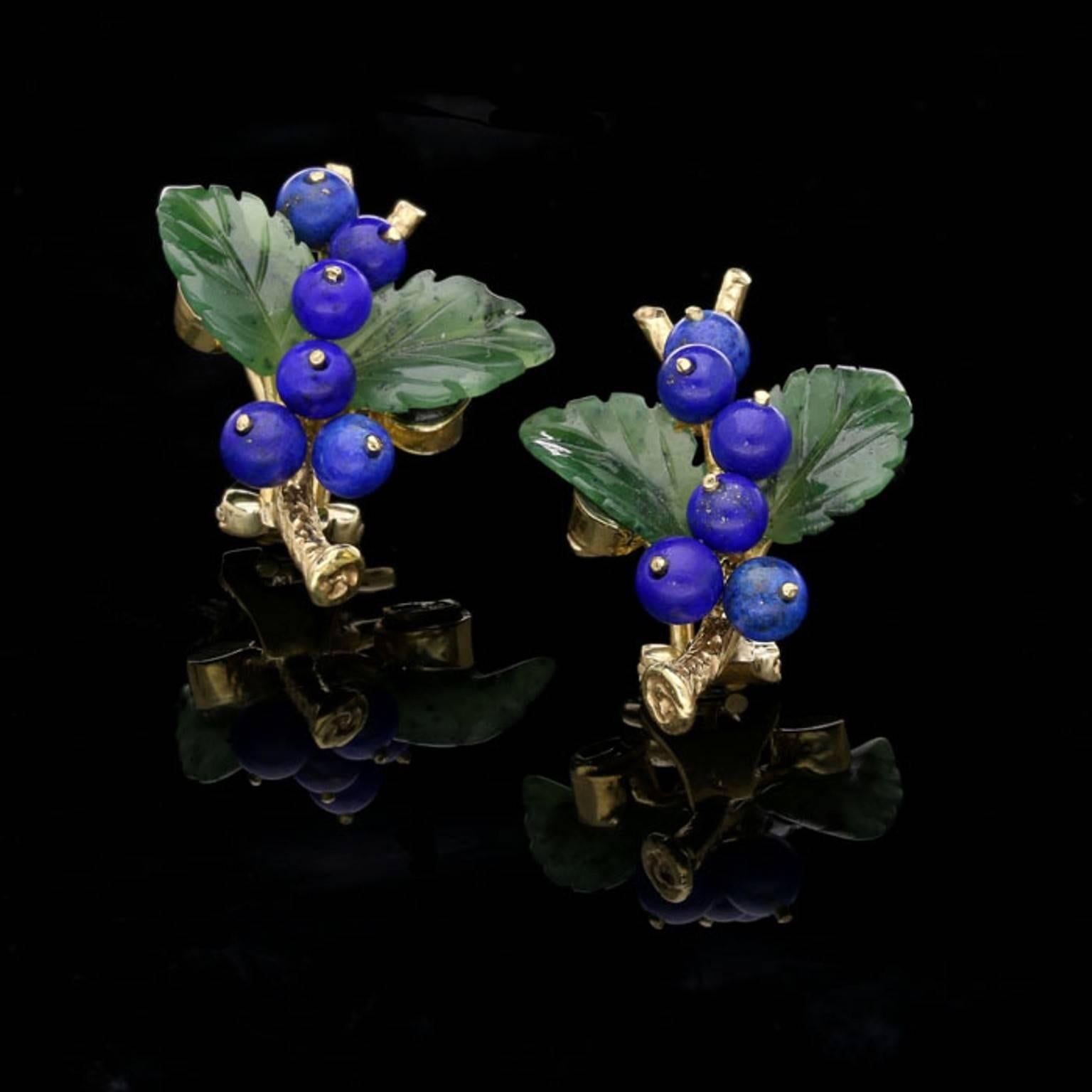 A sweet pair of gold and carved gemstone earrings by Paltscho c.1950s, each earring designed as a forked branch in textured 18ct yellow gold adorned with a pair of carved nephrite-jade leaves and six round berries fashioned from bright blue beads of