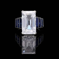 Art Deco Emerald-Cut 'Golconda' Diamond Ring with Graduated Sapphire Shoulders