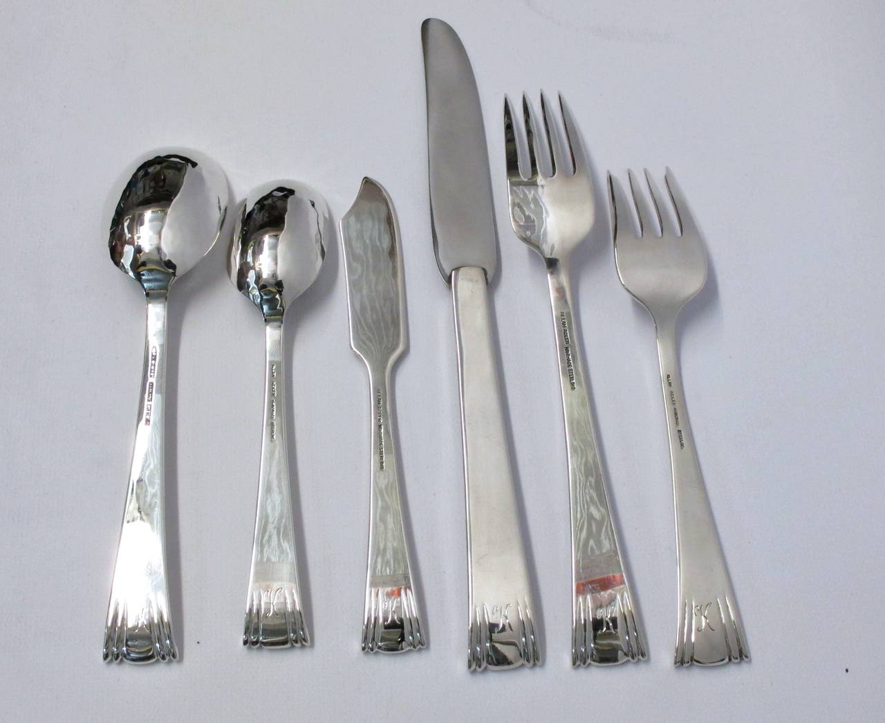 Elegant Allan Adler flatware set in the pattern 