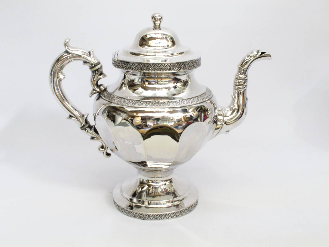 Three piece coin silver tea set by Ball Tompkins & Black circa 1851. 
Teapot- 10